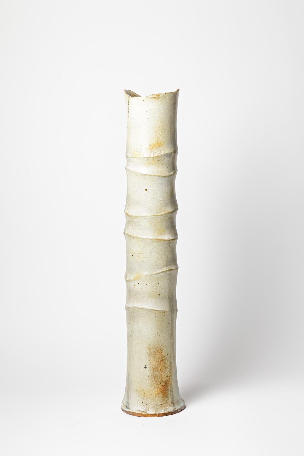 Large tubular vase « Bambou » in white glazed stoneware by Jean-Pierre Bonardot. 
Artist monogram under the base. Unique piece. circa 1990.
H : 25.9’ x 4.7’ x 4.7’ inches.