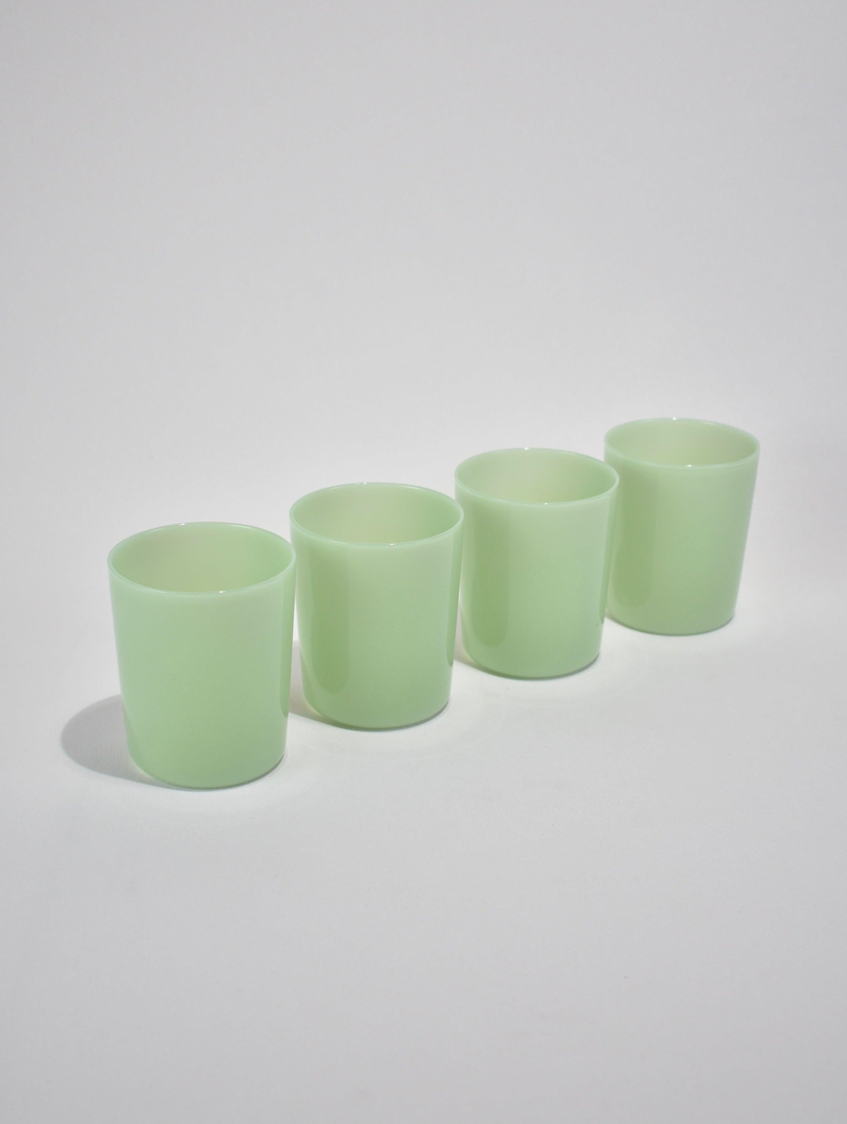 Glass tumbler set of four in opaque mint by Maison Balzac. 

Food grade colored glass, individually mouth blown.
Heat and cold resistant.
Hand wash recommended.
450ml capacity
Dimensions
Height: 4 in (10.16 cm).