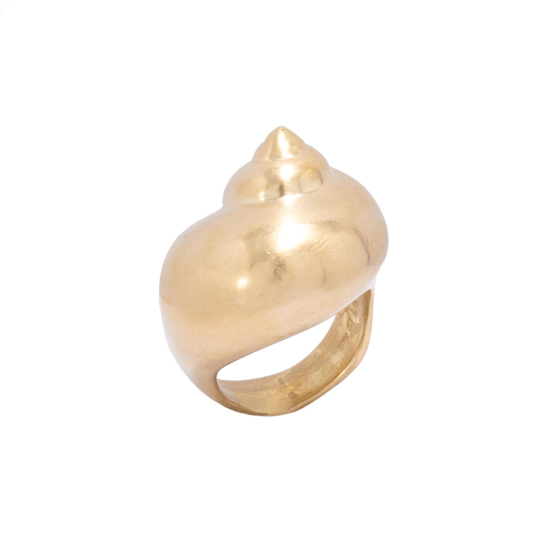 Our large turban shell ring is hand crafted in our studio of 18k gold and is a tribute to the sea. Carved to sit on the finger so that it's profile changes with the perspective, this ring is crafted with our signature satin finish. While the turban