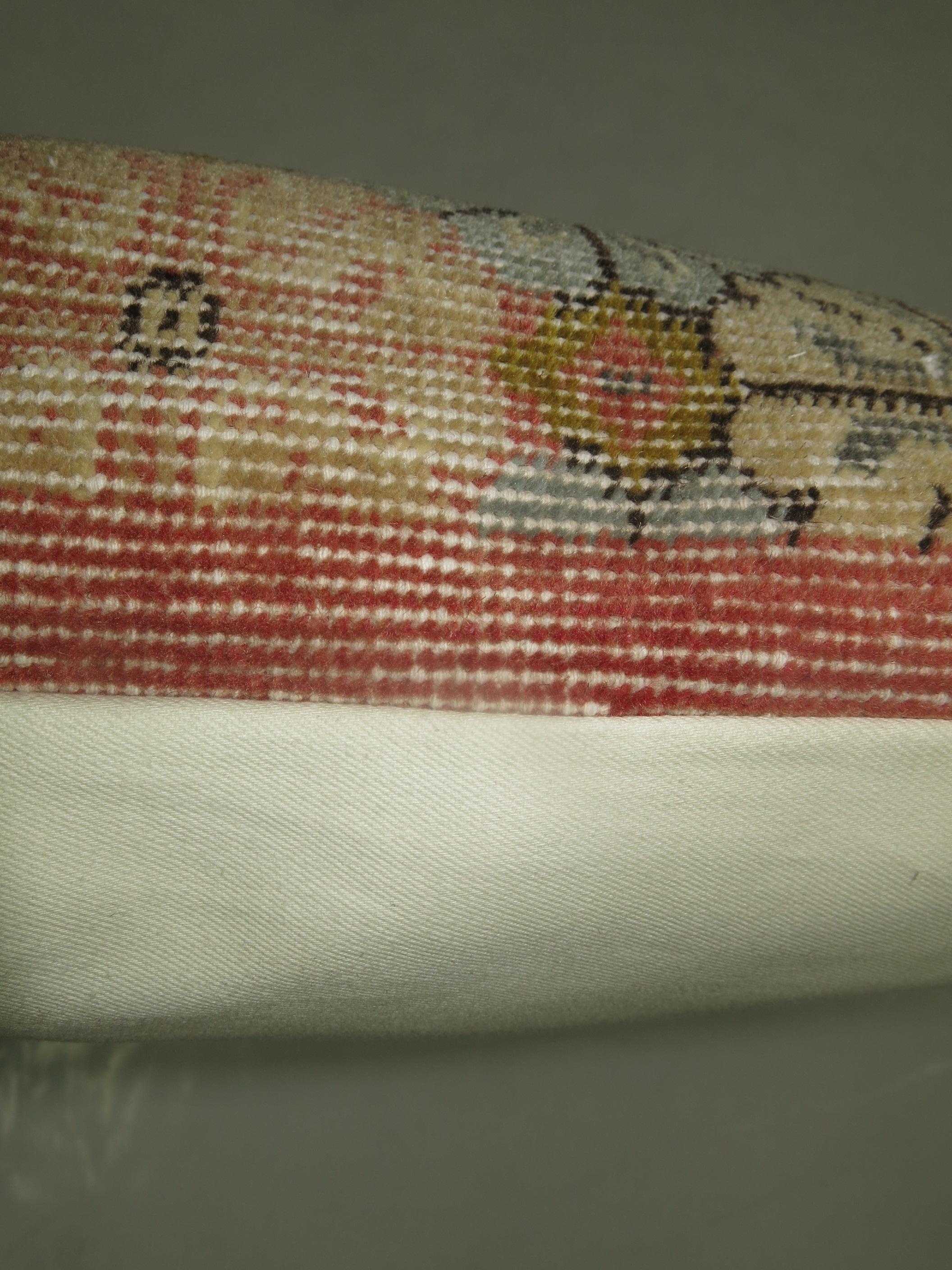 Large Pillow made from a shabby chic Turkish rug.

1'7'' x 2'5''