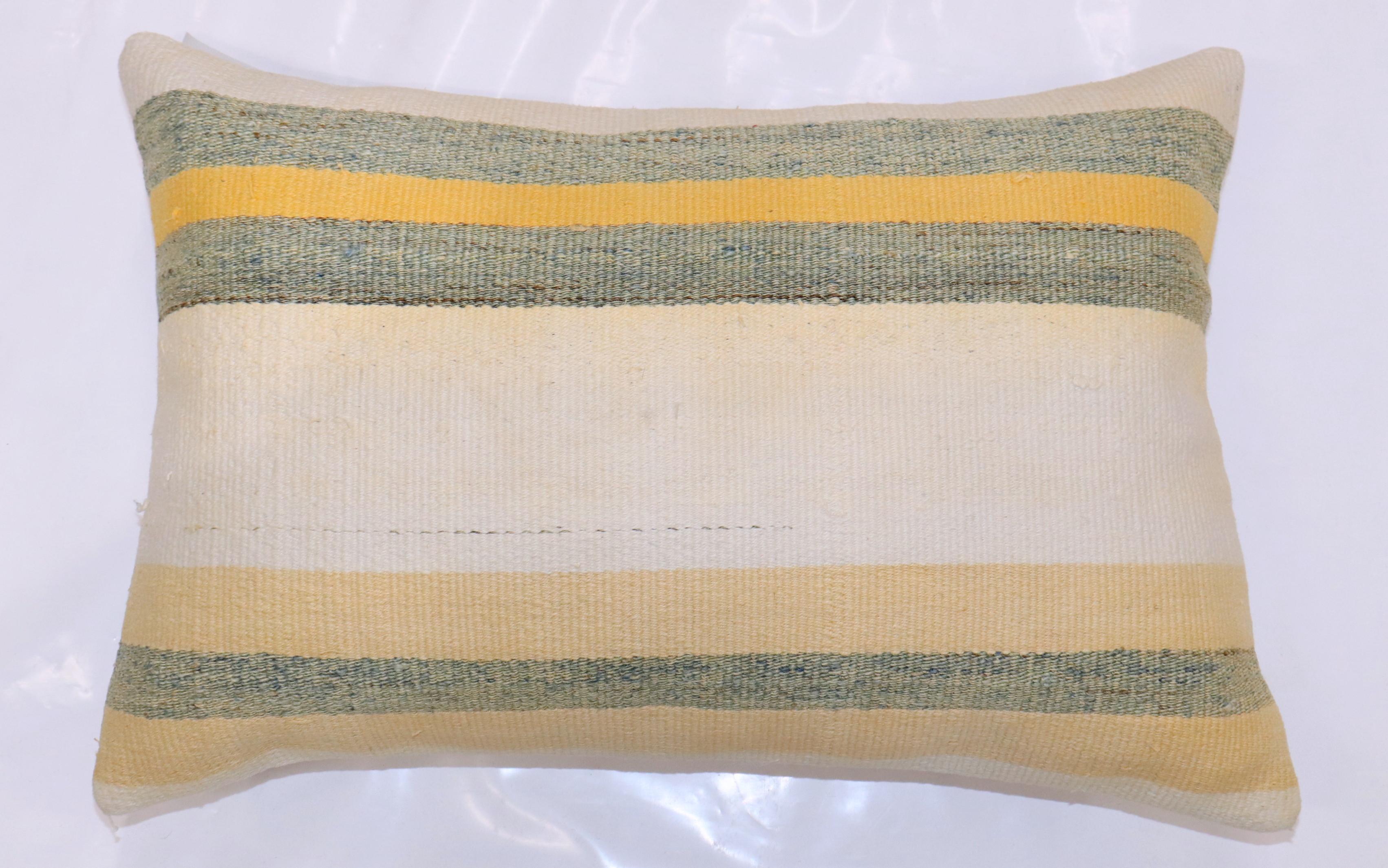 Pillow made from modern Turkish Kilim with a striped motif.

Measures: 16