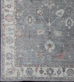 Hand-Knotted Oushak Rug in Charcoal Gray with Soft Coral, Ivory, and Blue