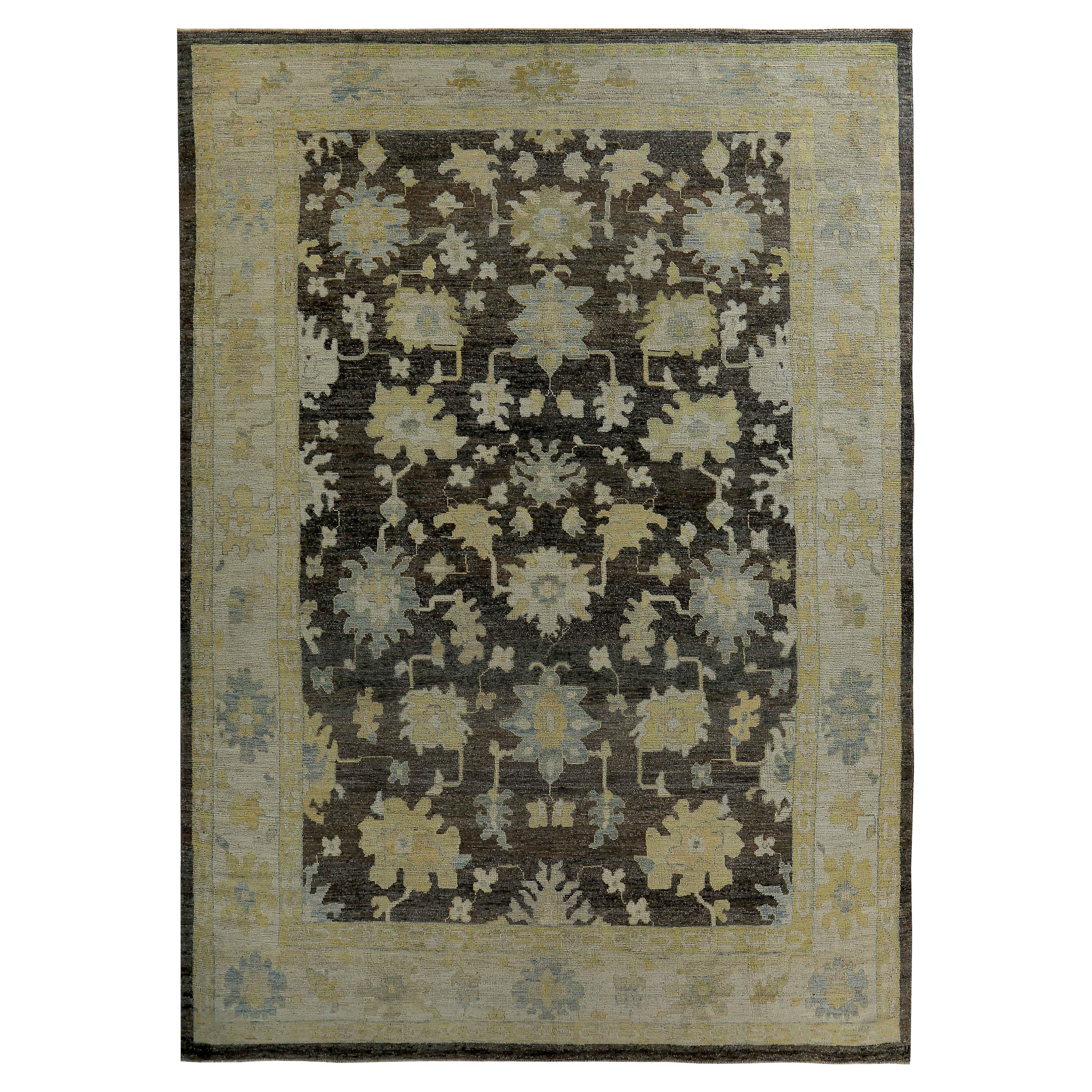 Large Turkish Oushak Rug with Blue and Gold Floral Details on Brown Field For Sale
