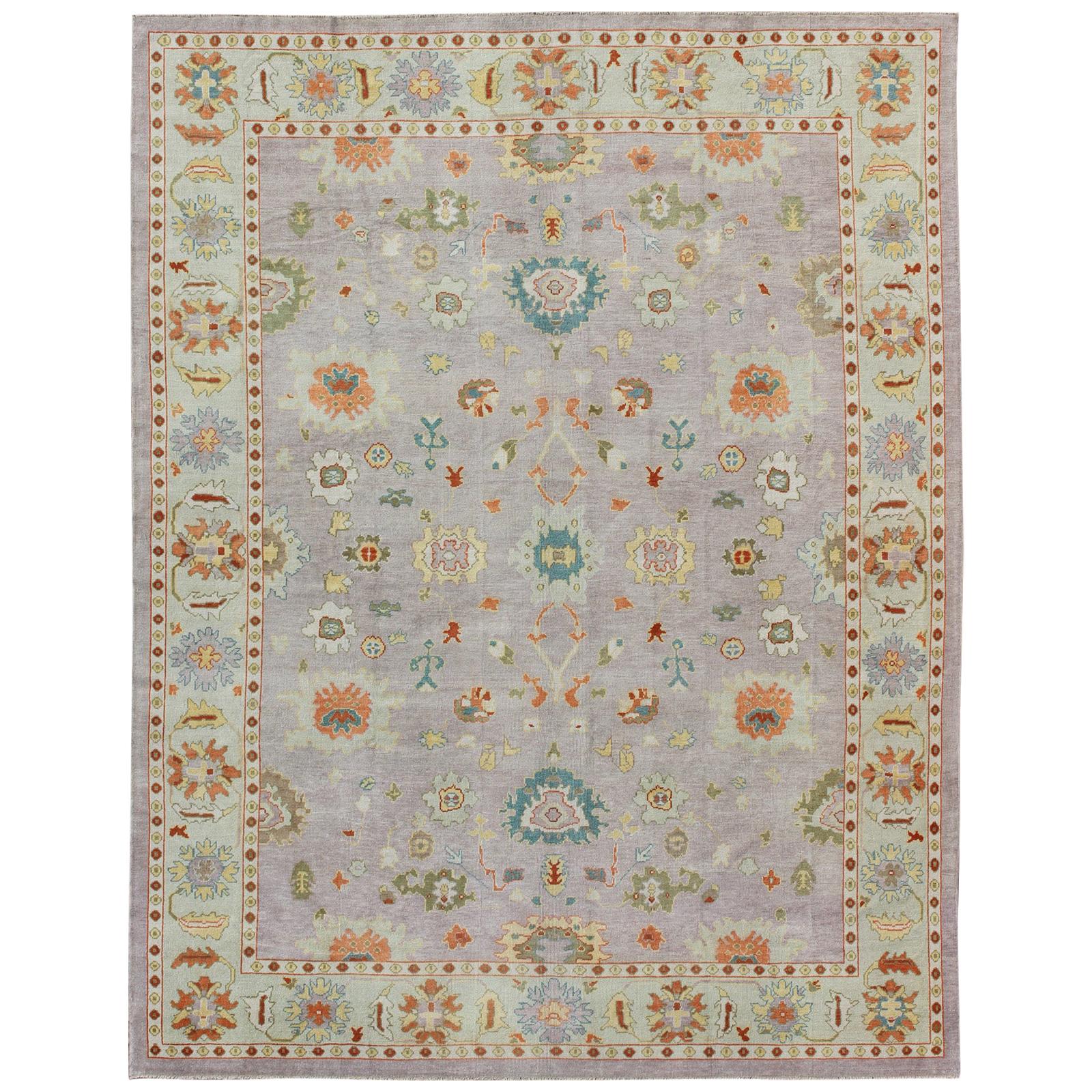 Colorful Turkish Oushak Rug With All-Over Flower Design in Lavender, Light Green For Sale