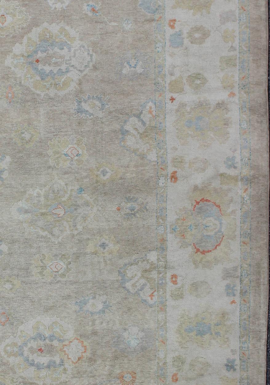 Contemporary Large Turkish Oushak Rug with Neutral Color Palette and All-Over Flower Design For Sale