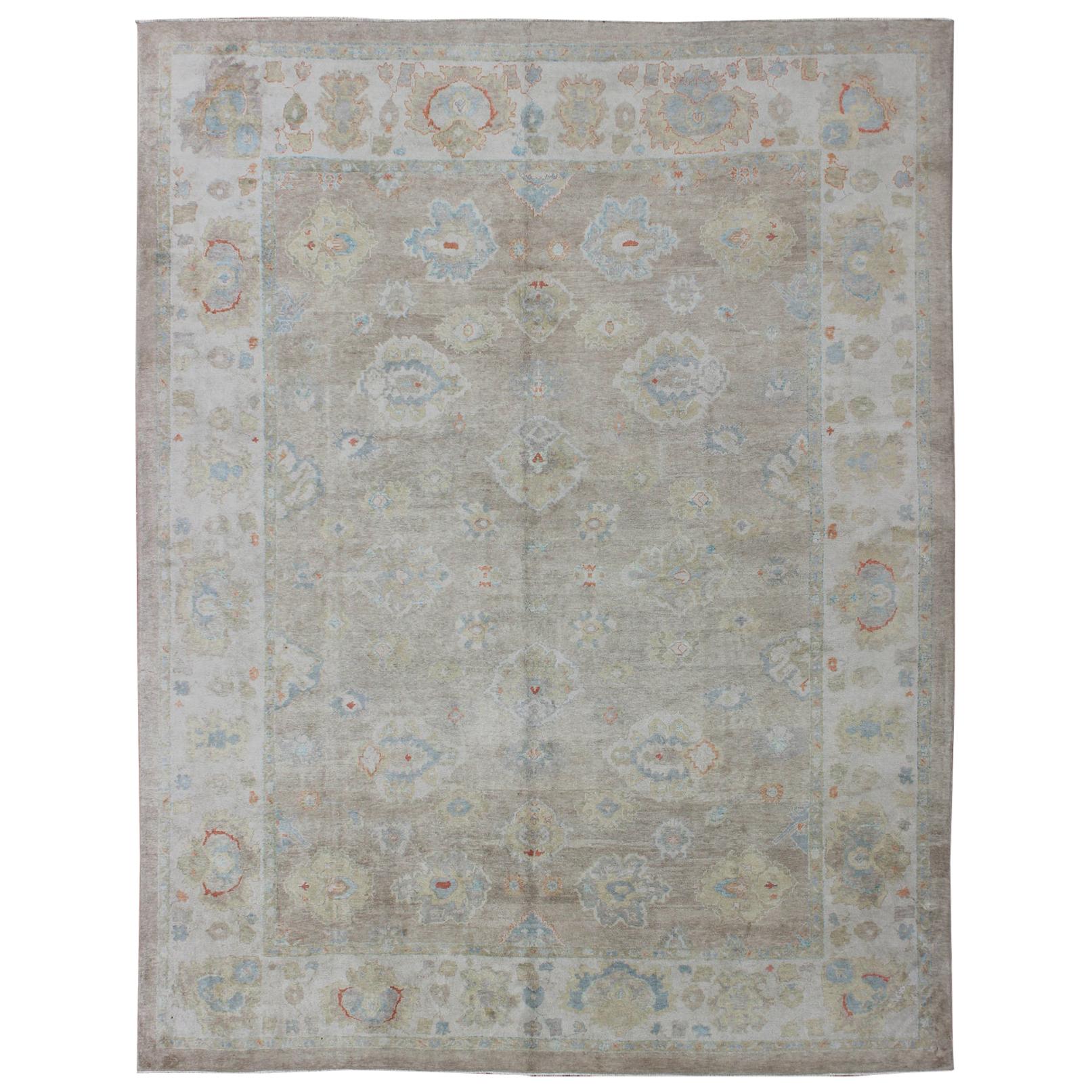 Large Turkish Oushak Rug with Neutral Color Palette and All-Over Flower Design For Sale
