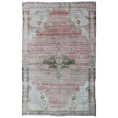 Large Turkish Rug in Pink tones with Light Olive Green, Brown, Cream and Tan