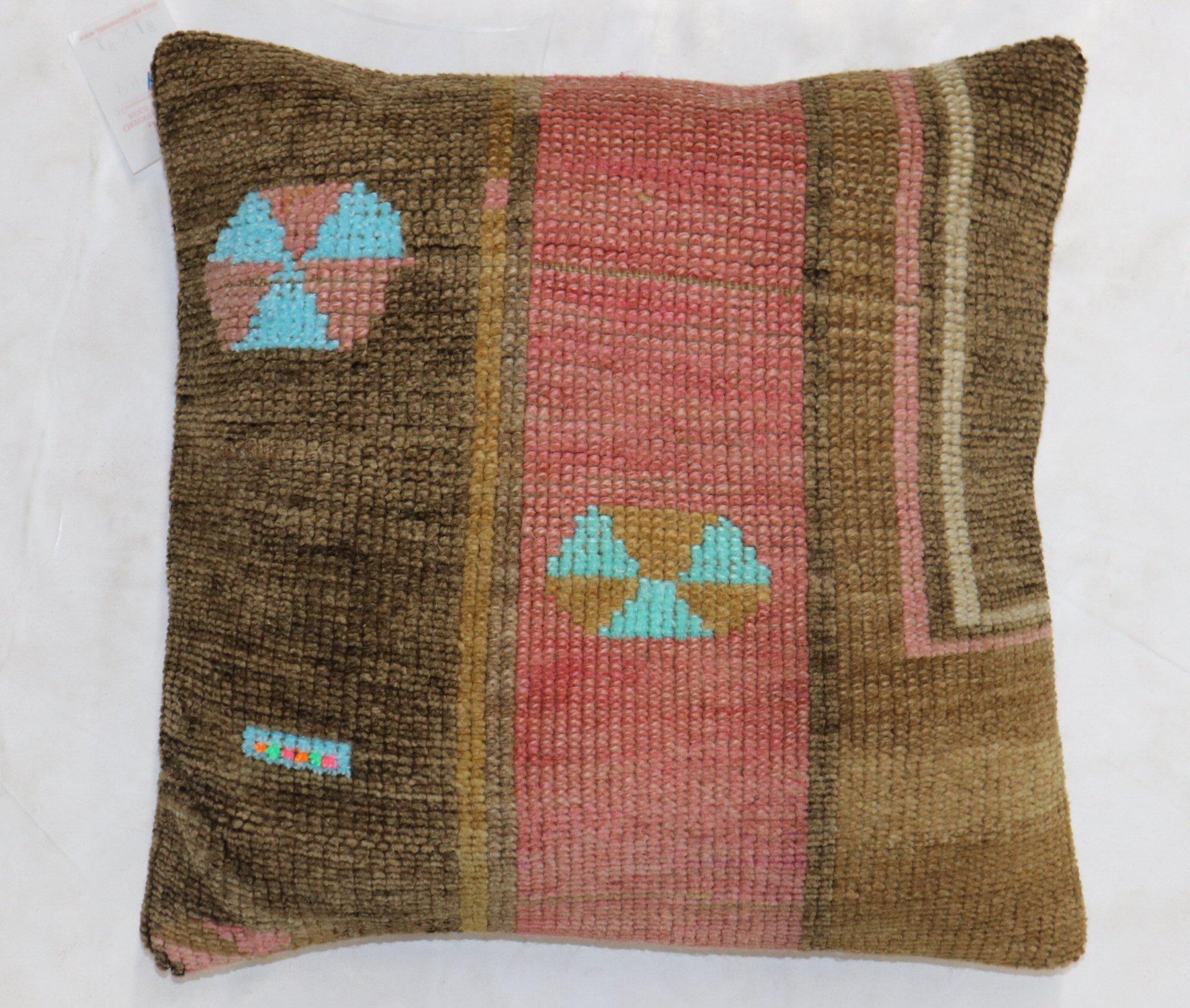Pillow made from a mid 20th century Turkish rug. Foam and zipper closure provided

Measures: 20'' x 20''.