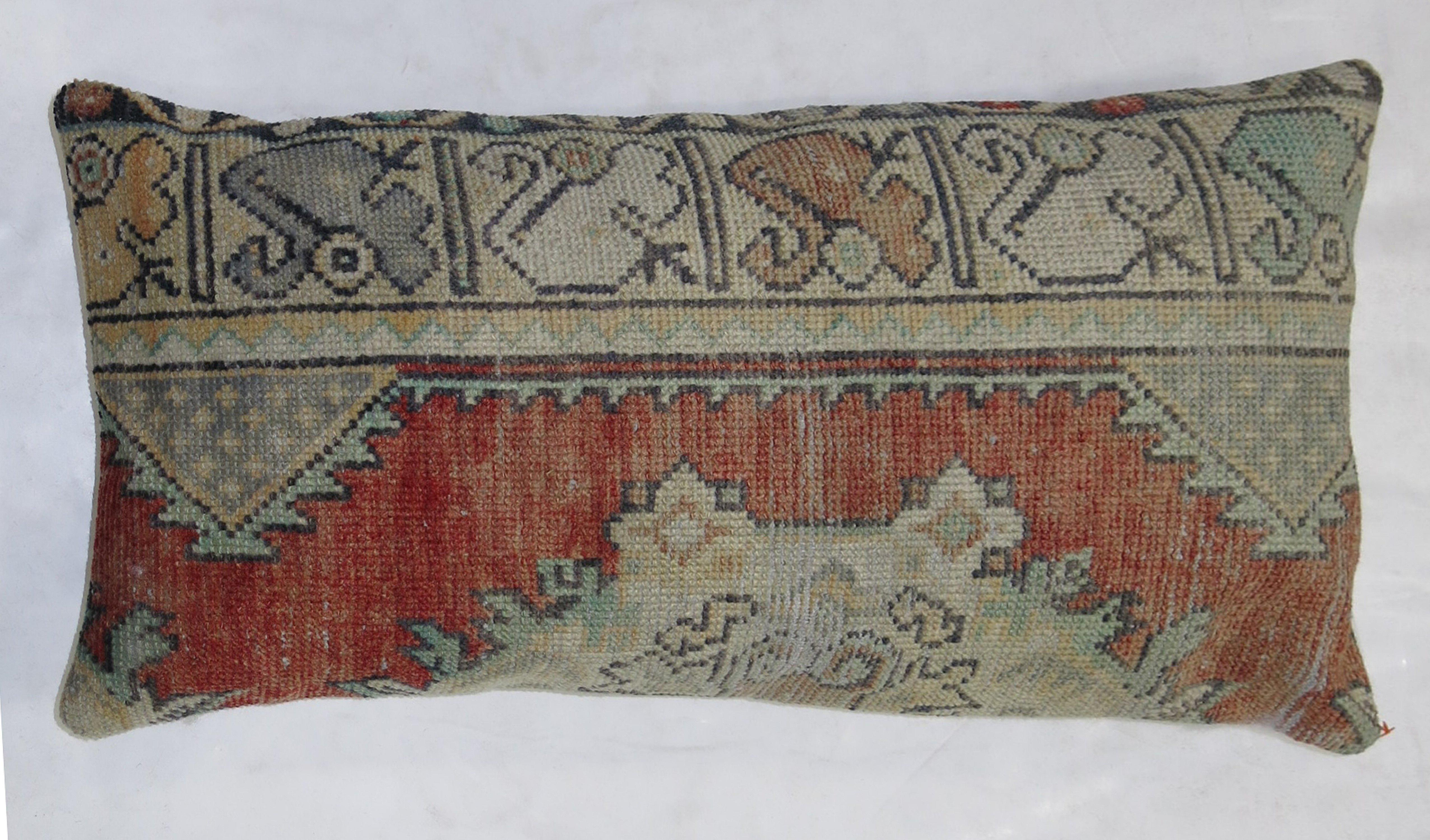 Large Pillow Made from a turkish anatolian Rug

Size: 15'' x 28''.