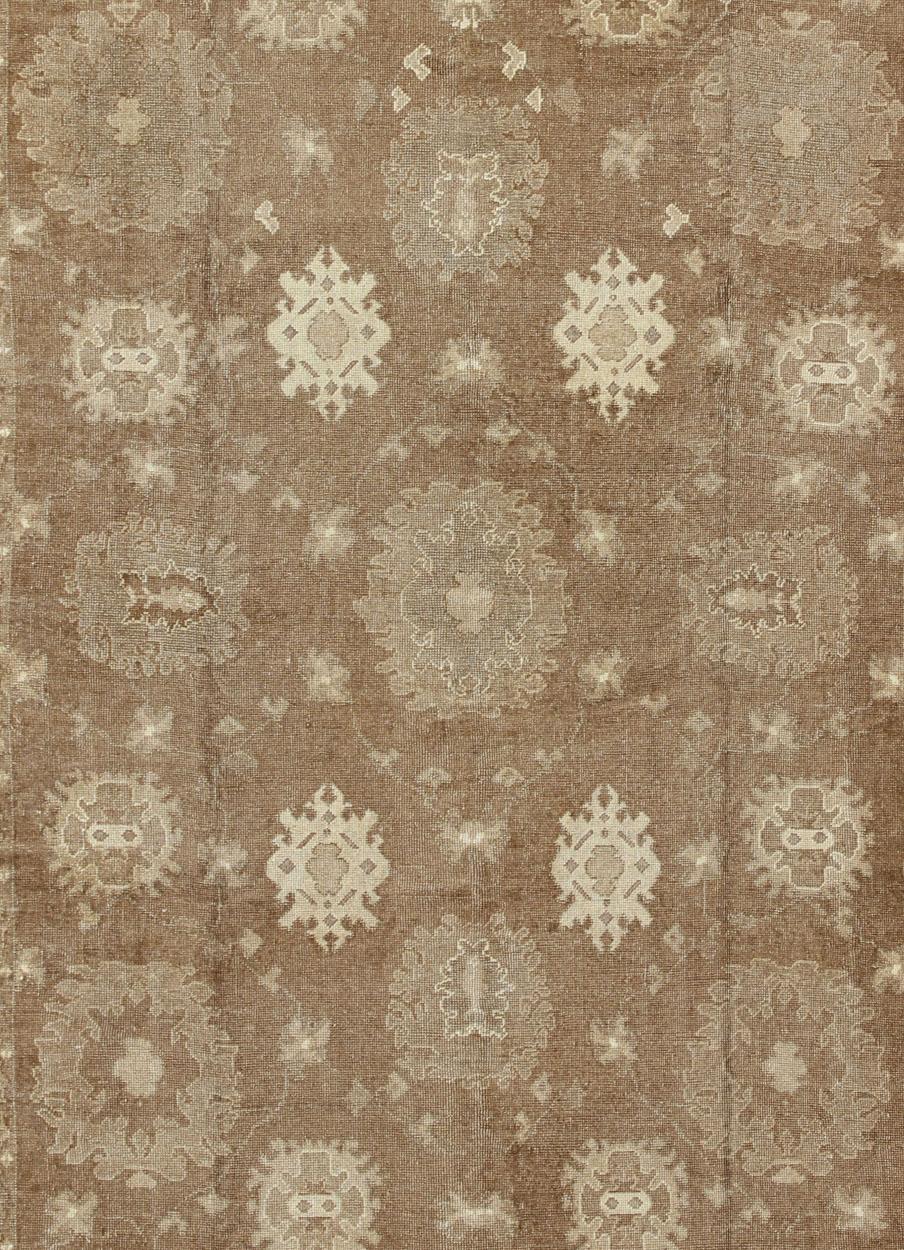 Oushak Large Vintage Turkish Rug in Light Brown Field, Taupe, Ivory and Earth Tones   For Sale