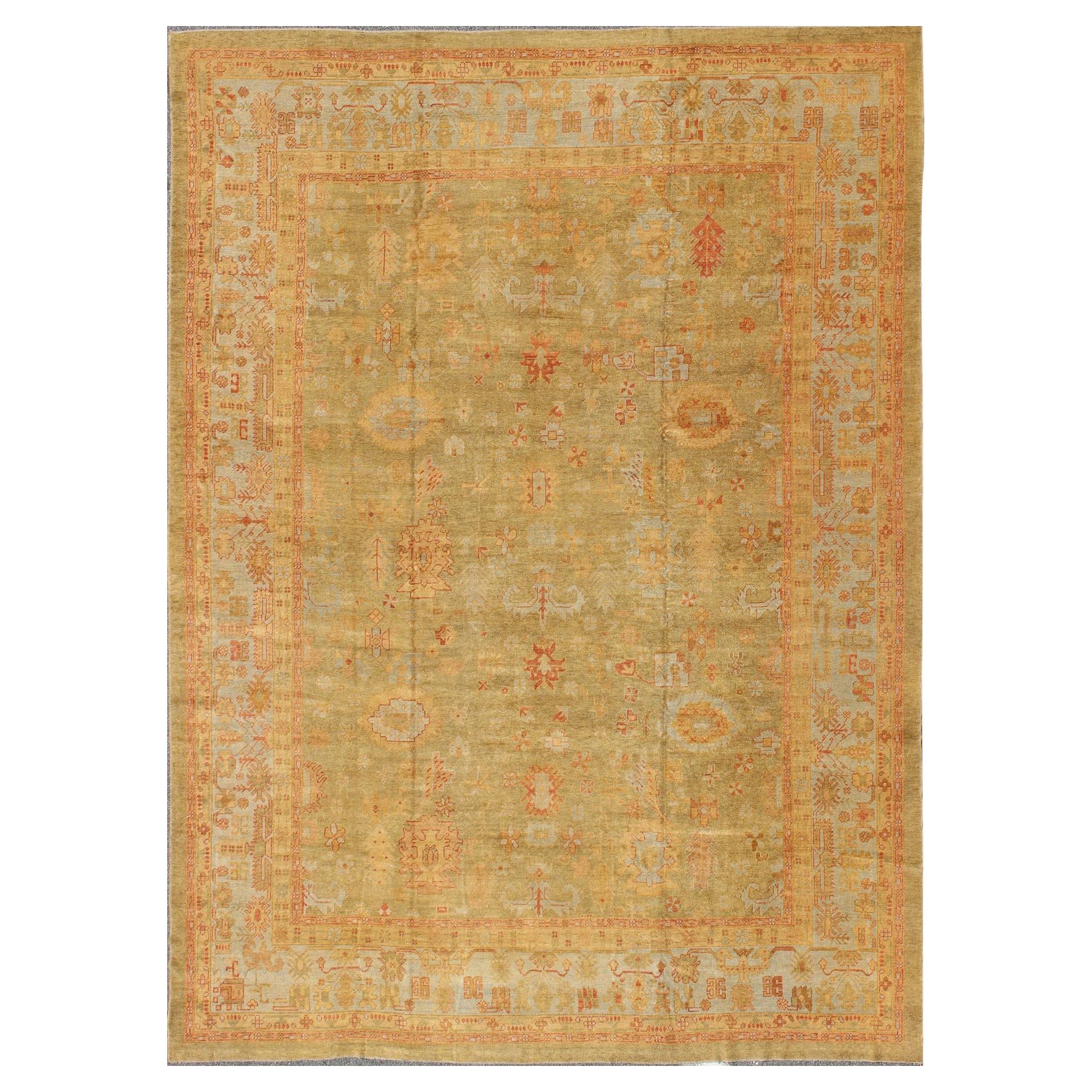 Großer türkischer Oushak-Teppich im Vintage-Stil mit großformatigem Design in Grün und Rot