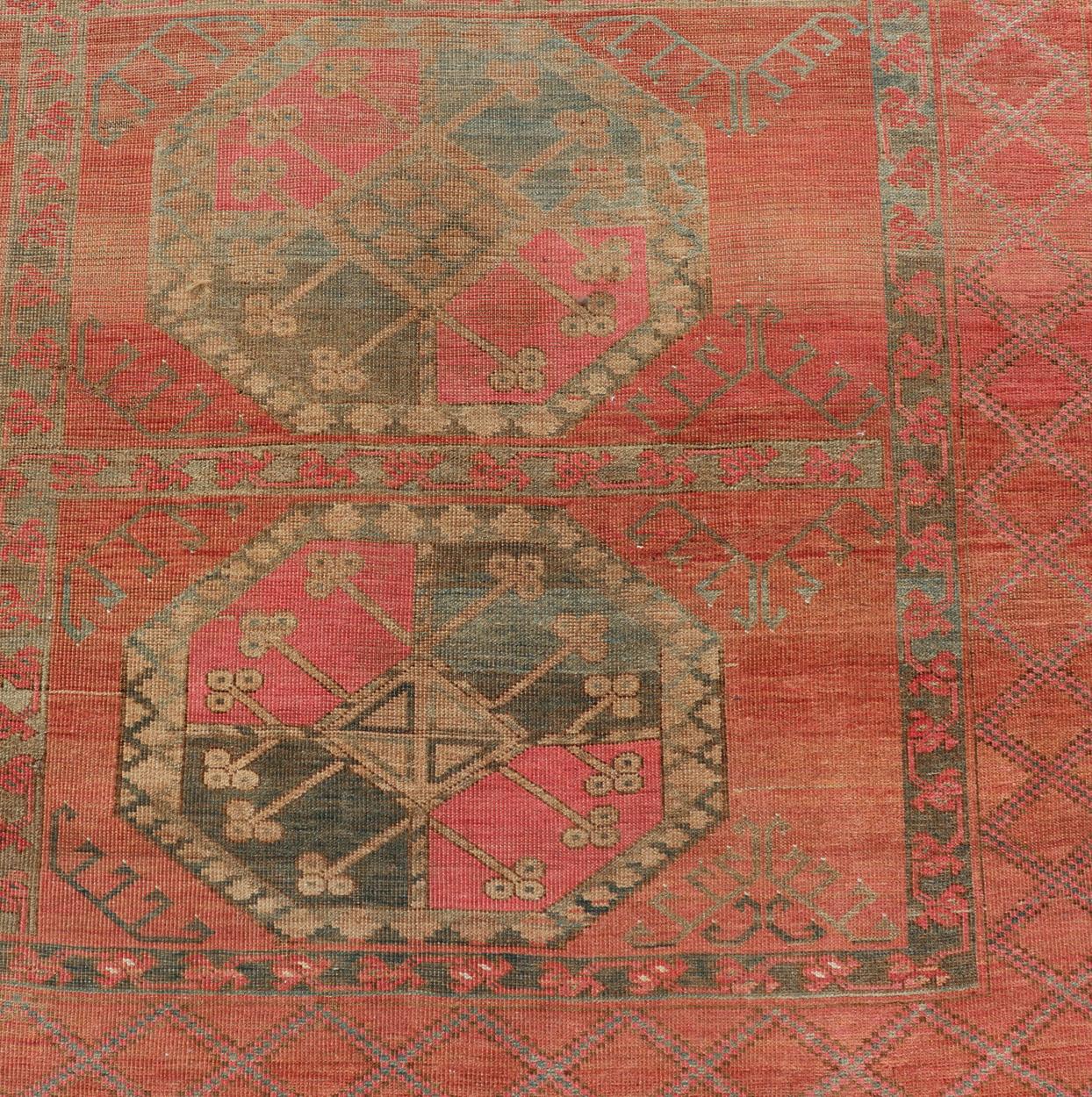 Hand-Knotted Large Turkomen Ersari Rug with All-Over Gul Design in Tan, Coral, and Brown For Sale