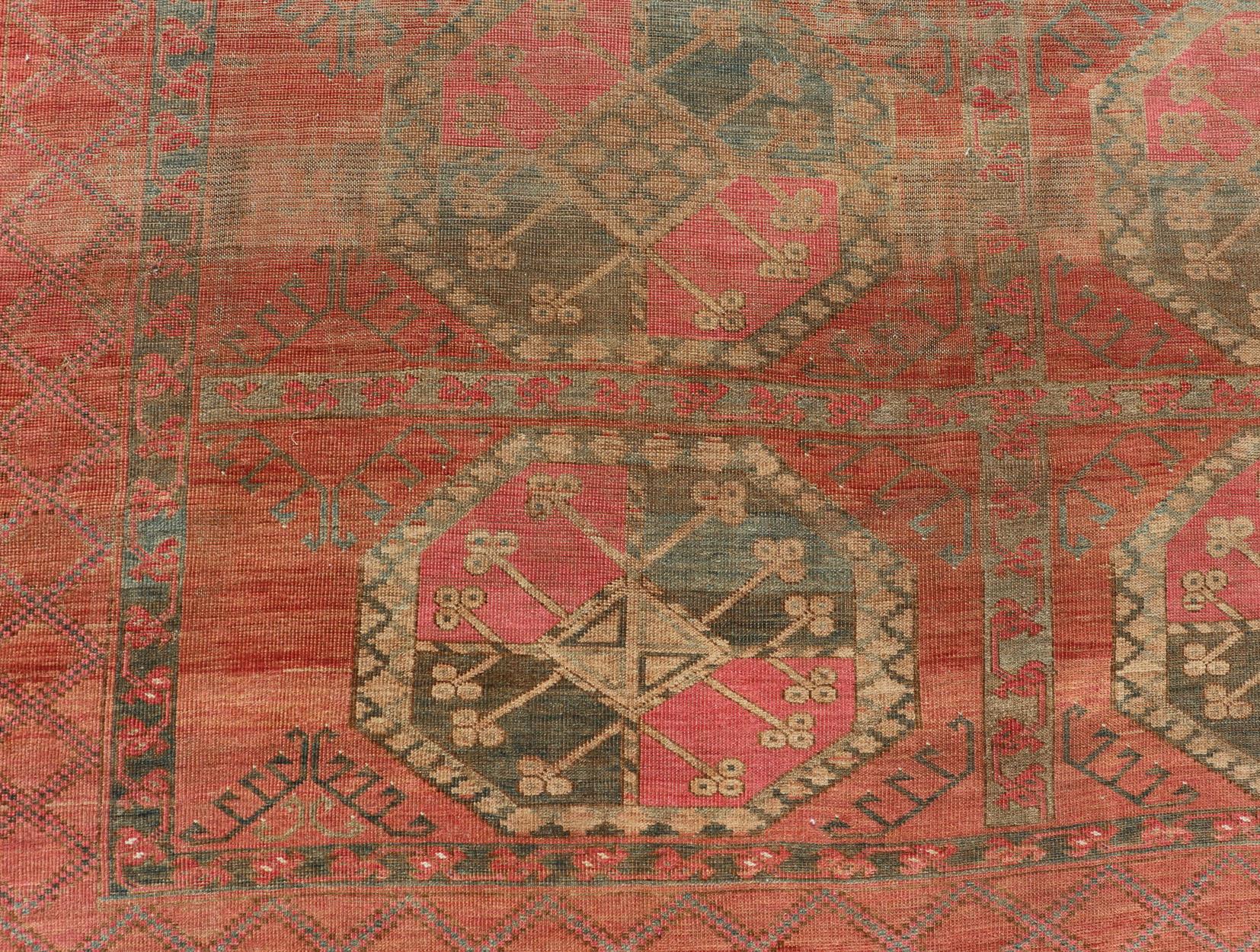 Large Turkomen Ersari Rug with All-Over Gul Design in Tan, Coral, and Brown In Good Condition For Sale In Atlanta, GA