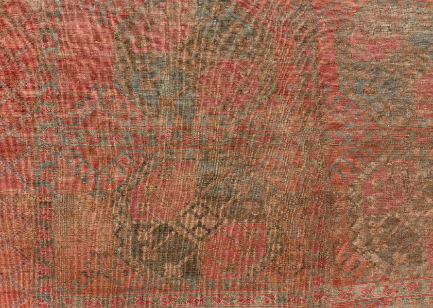 20th Century Large Turkomen Ersari Rug with All-Over Gul Design in Tan, Coral, and Brown For Sale