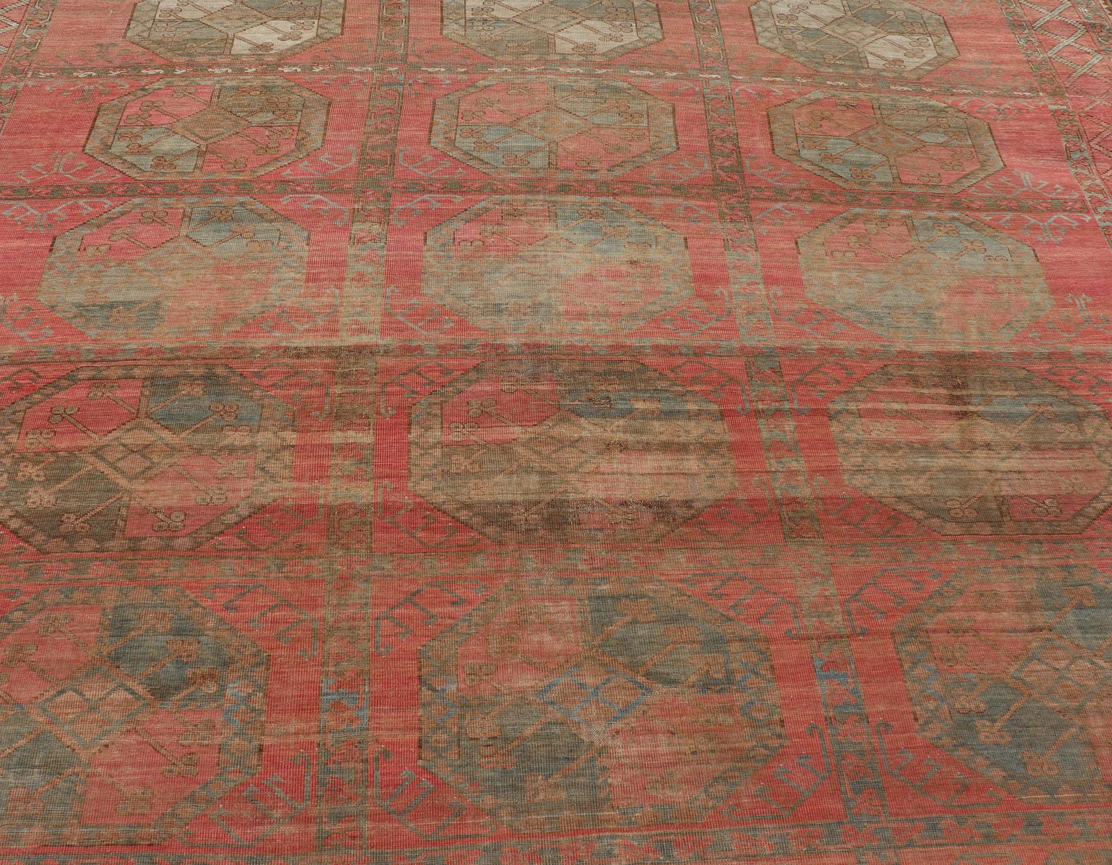 Wool Large Turkomen Ersari Rug with All-Over Gul Design in Tan, Coral, and Brown For Sale