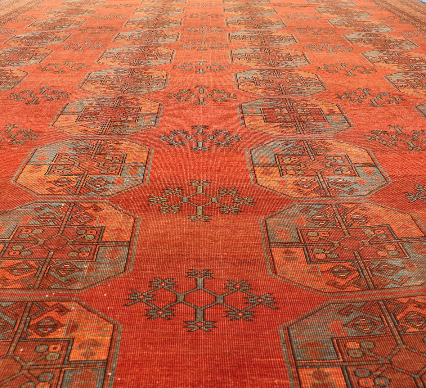 Large Turkomen rug with All-over Gul Bokhara design. Hand-Knotted 1930's Turkomen Rug with Repeating Gul Design. Keivan Woven Arts; rug EMB-9503-P13580, country of origin / type: Turkestan / Ersari/Turkoman, circa 1930s.

Measures: 11'1 x 13'