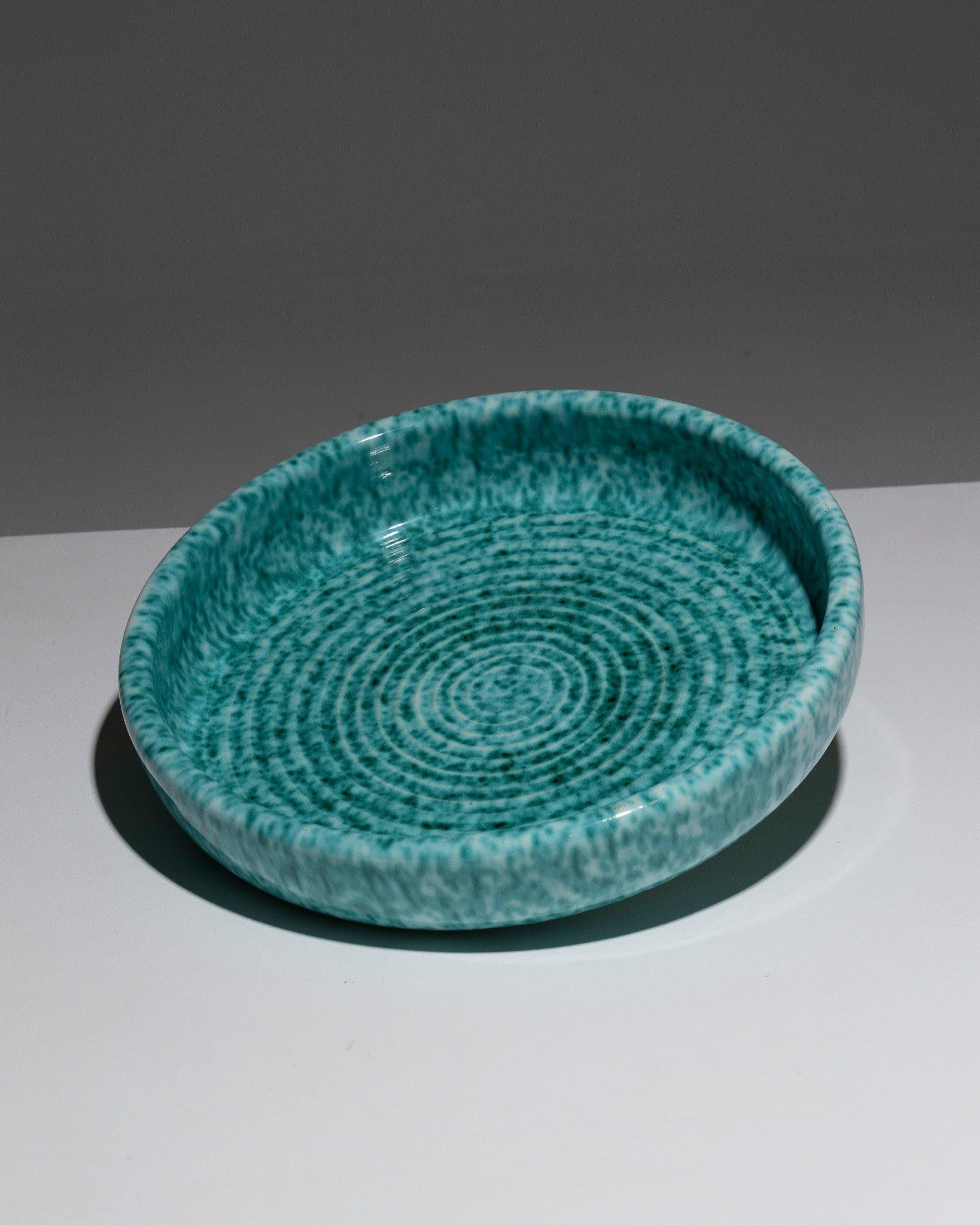 Large Turquoise Faience Fruit Bowl or Plate by Fernand Elchinger, 1950s. Decorative turning marks are left visible under the copper-green glaze, speckled with white. Printed mark: Céramique d'Art / Elchinger Fils / Soufflenheim / France. Very good