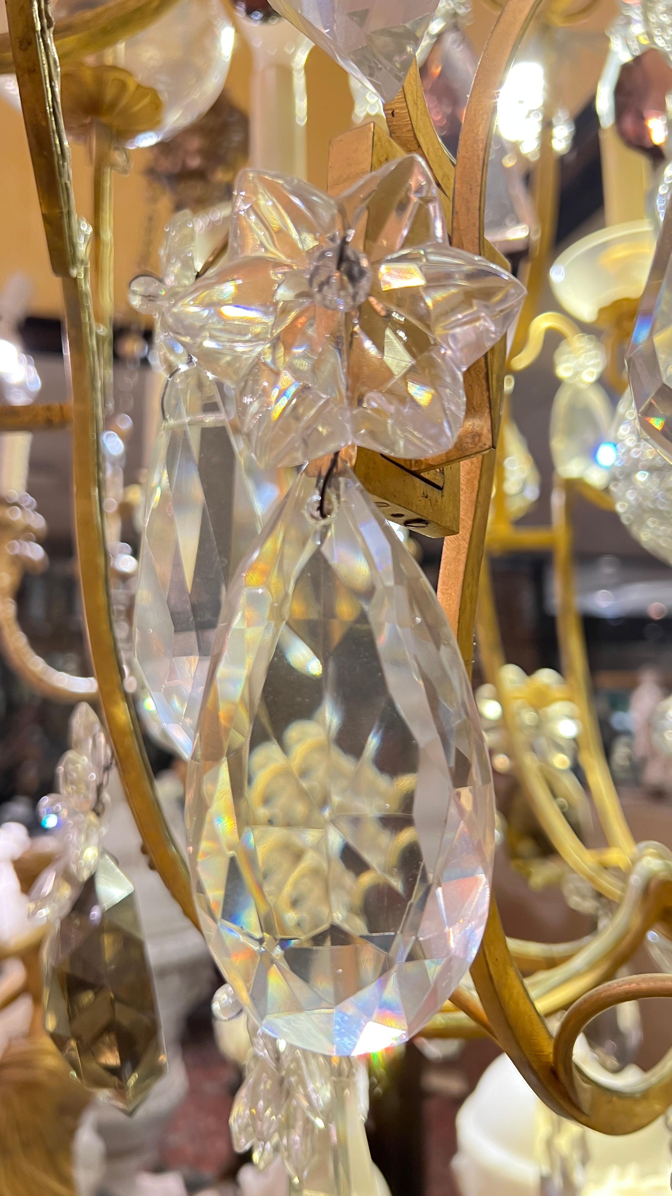 Large Twelve Light Crystal and Bronze Chandelier Attributed to Bagues For Sale 1