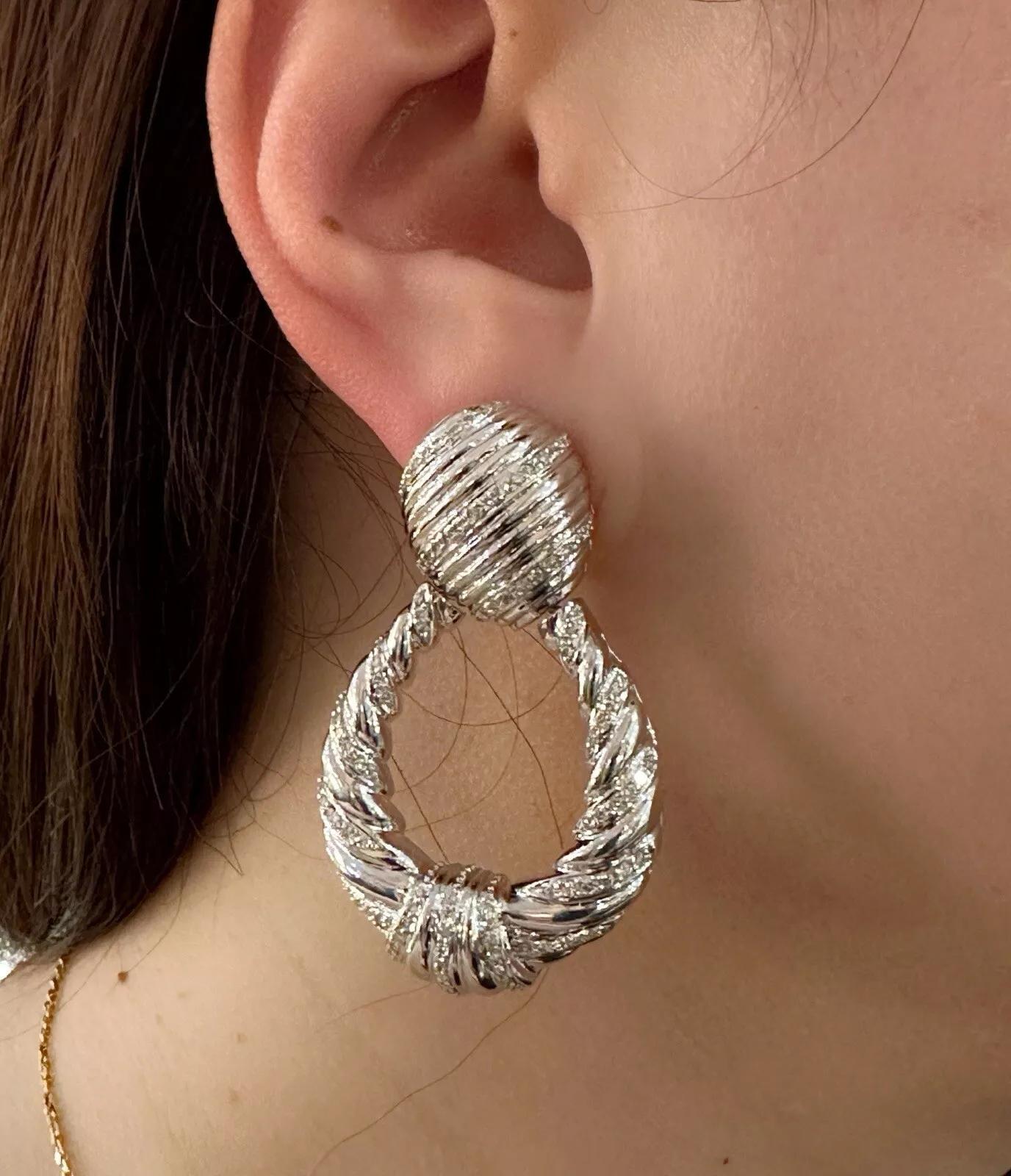 Round Cut Large Twist Diamond Door-knocker Drop Earrings in 18k White Gold For Sale