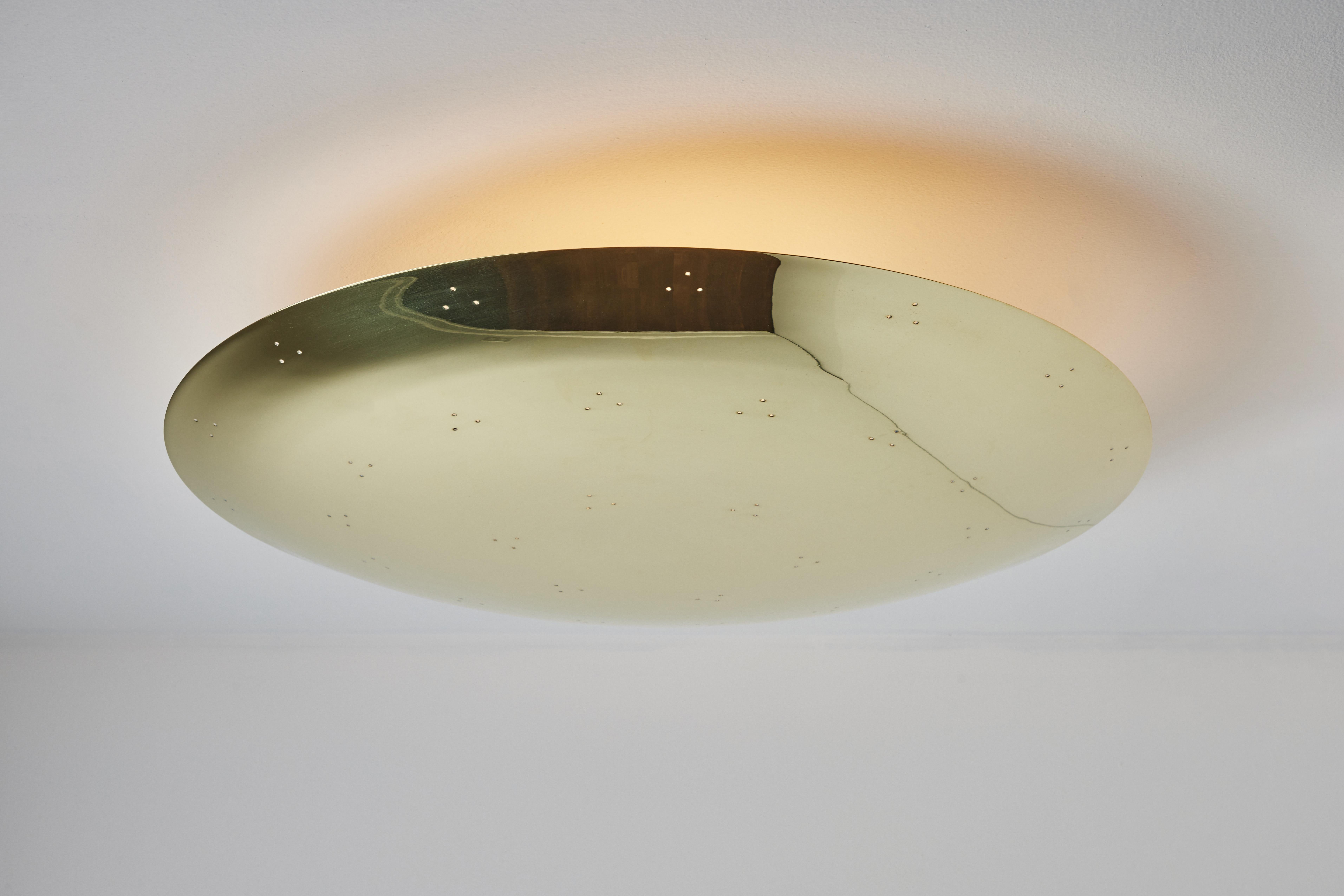 Contemporary Large Two Enlighten 'Rey' Perforated Polished Brass Dome Ceiling Lamp For Sale