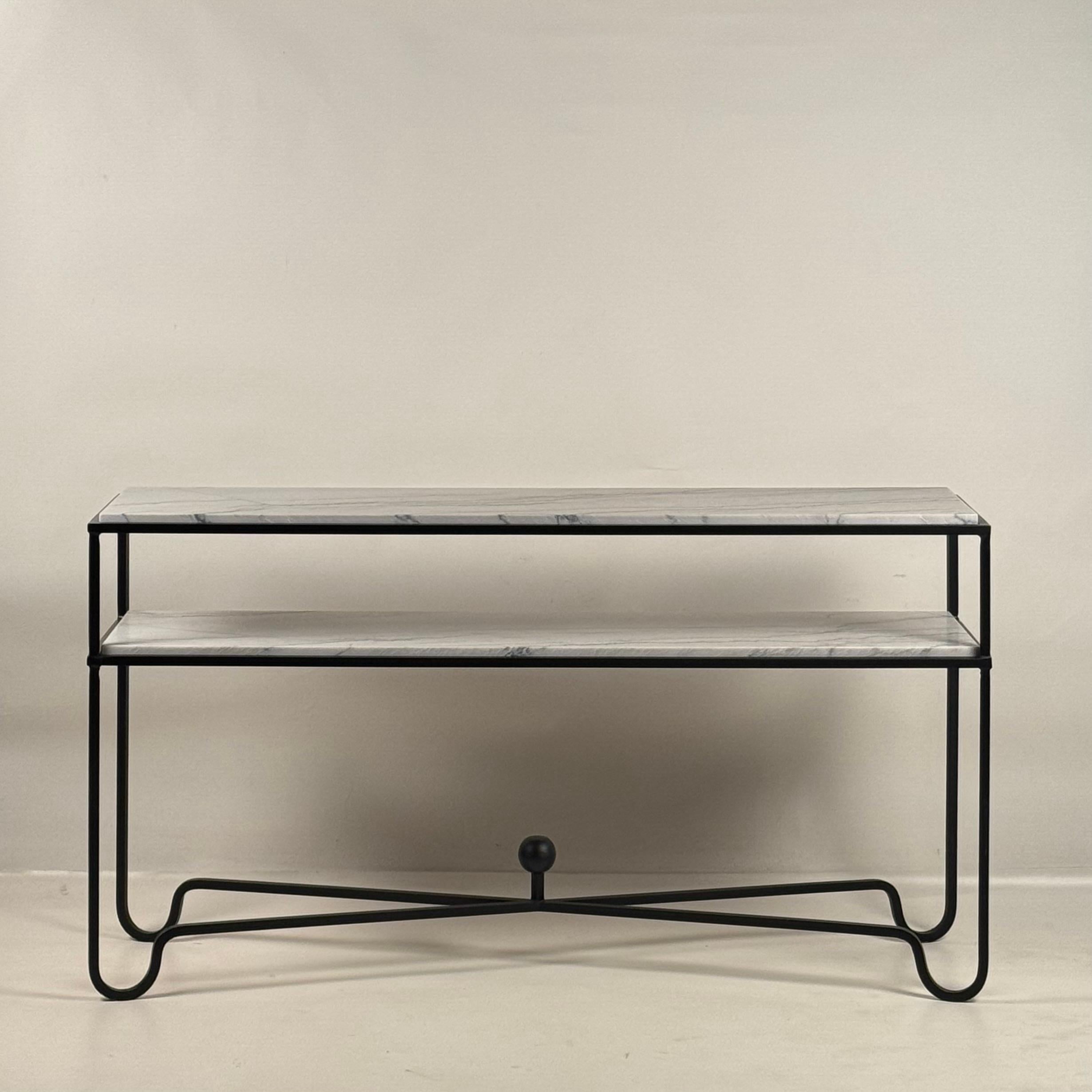 Large two-shelf console table in gorgeous Macaubas stone from Brazil.
Please note that stone is a natural material so slab color and veining may vary.
Please consult of FAQ page for more information in DESIGN FRÈRES line orders. Thank you.