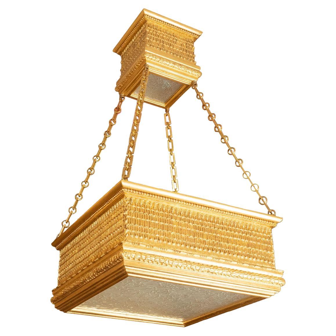 Grand pendentif en bois doré à deux niveaux de Carlos Villegas en vente