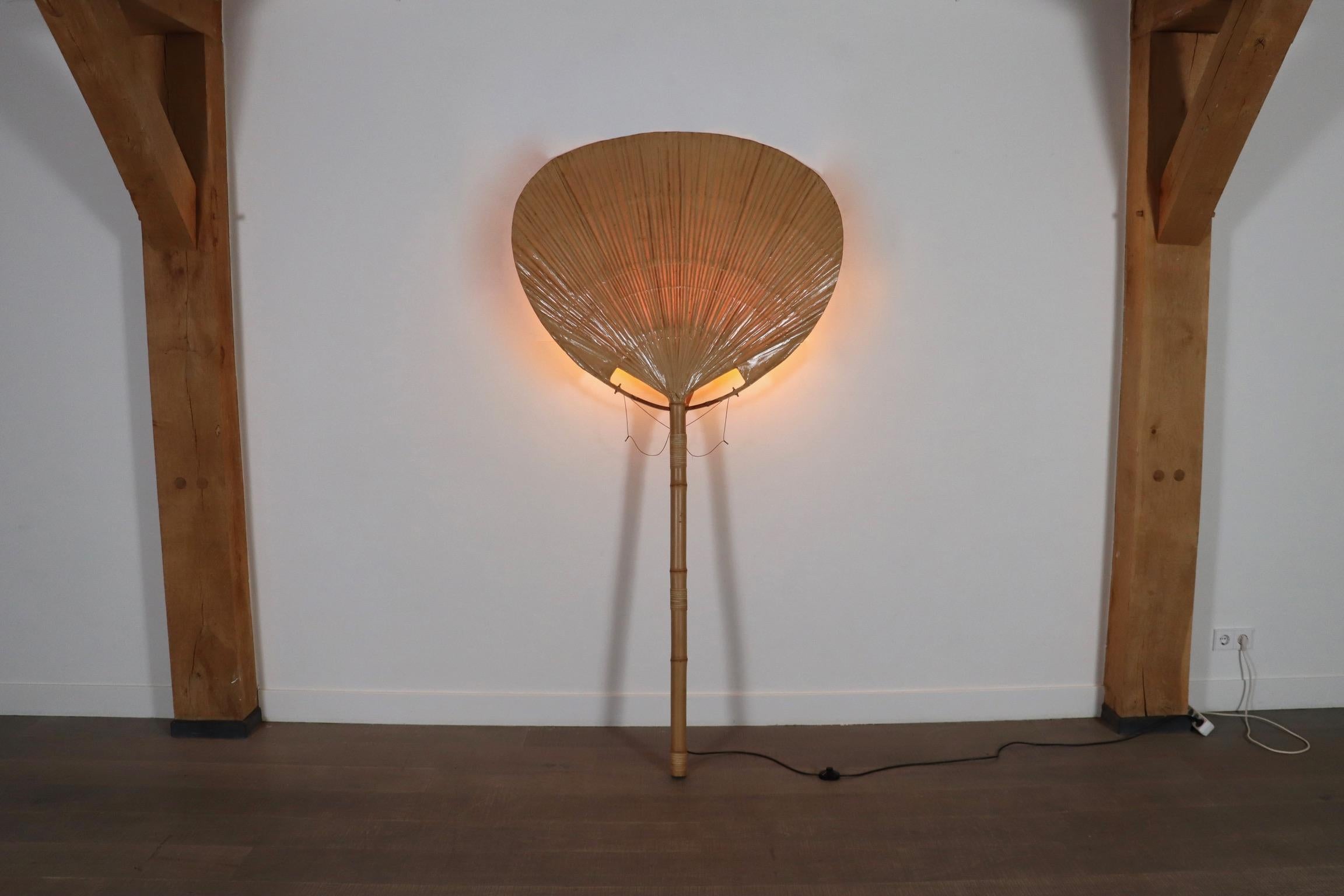 Rare Large Uchiwa floor lamp designed by Ingo Maurer for M Design , Germany 1977

A breathtaking design which is handmade from bamboo, rice paper and metal. The beautiful and huge floor lamp edition of the iconic Uchiwa series is a true collectors