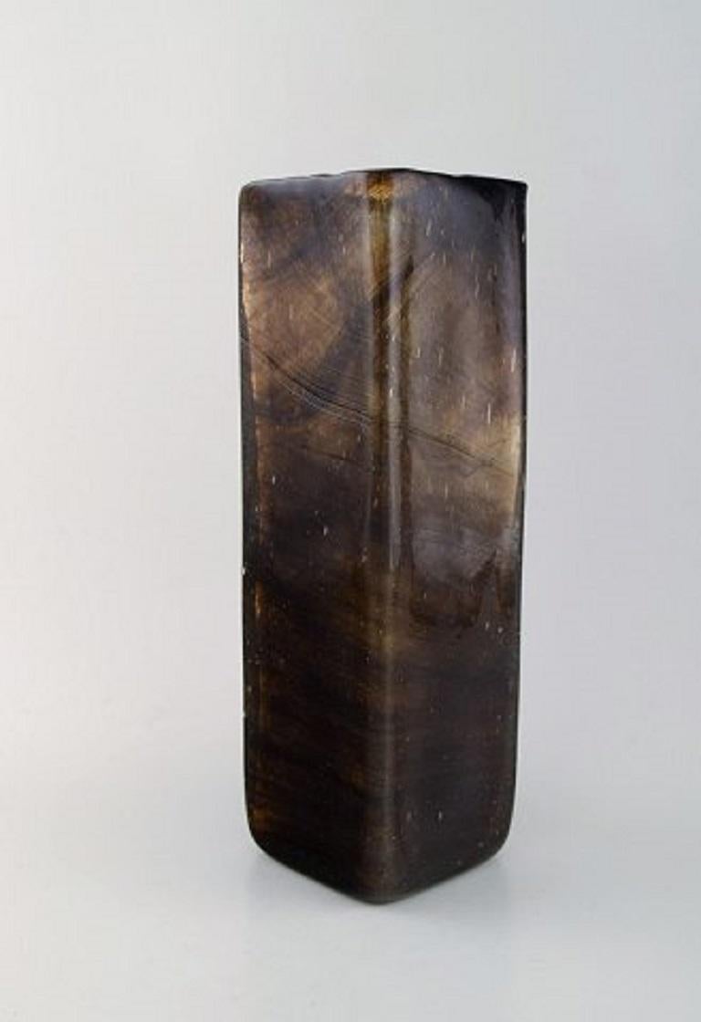 Large unique Per Lütken for Holmegaard, Lava vase in smokey art glass.
Denmark, mid-20th century.
A very beautiful vase of high quality.
Measures: 30 x 12 cm.
Signed.
In very good condition.









 