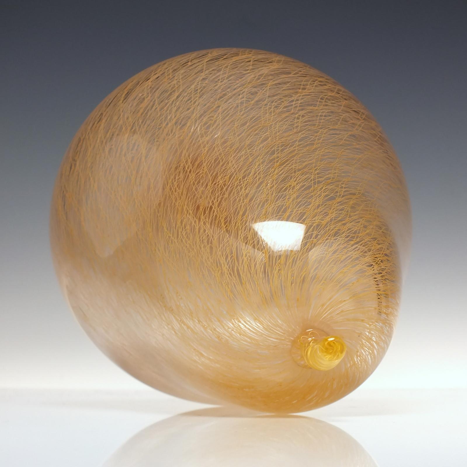 A unique Mike Hunter Merletto Glass Pear dating to 2012.

Merletto, meaning lace in Italian, is a technique in which very thin canes are used to create a very intricate and somewhat organic pattern in the finished piece by utilizing an optic mold