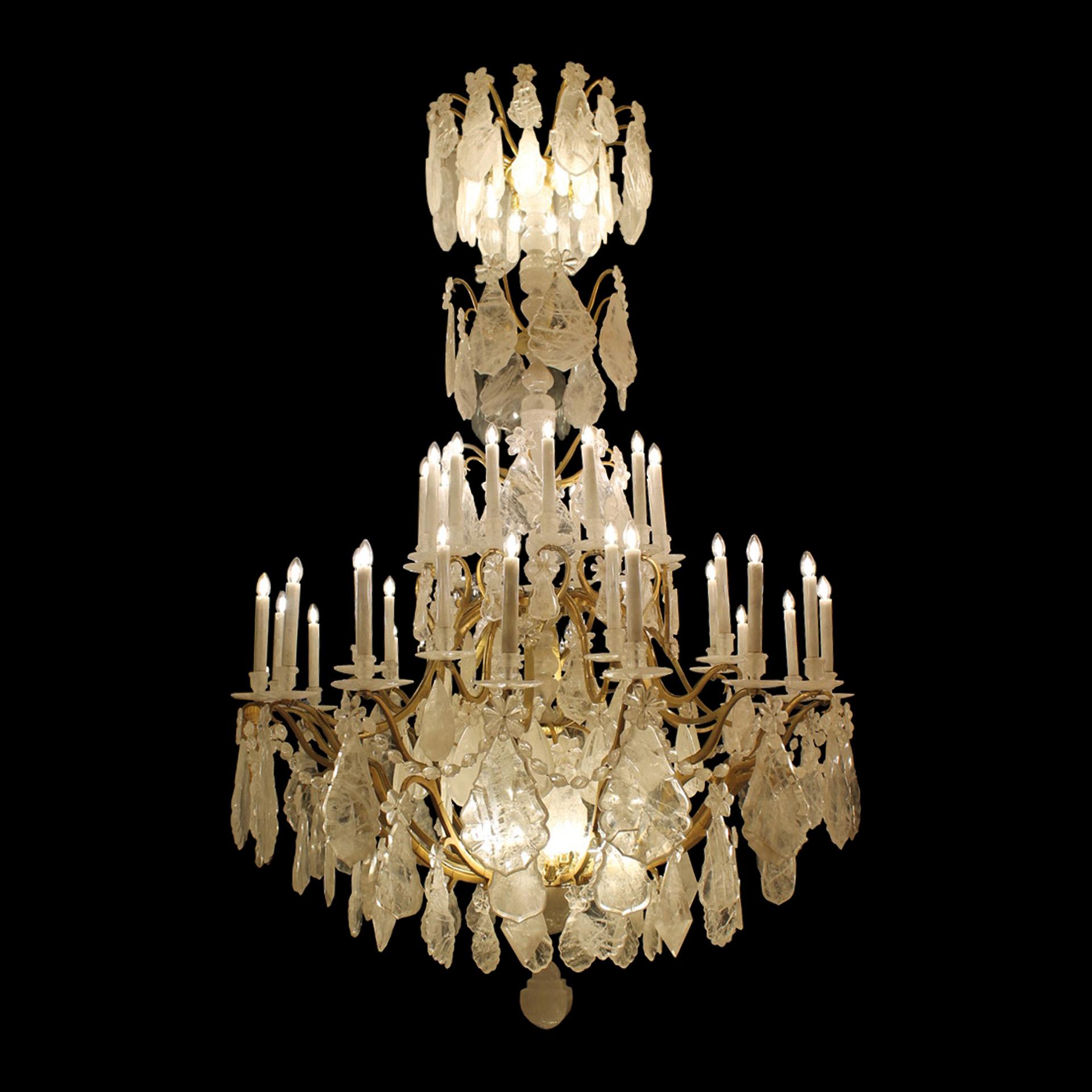 Amazing French  of antique grand rock crystal chandeliers in the Louis XV style. Original circa 1910 Gilt bronze frame with 80 lights, with a lovely aged finish, redressed in rock crystal by Dimitri Stefanov. Dimensions : Height 300 cm x 180 cm