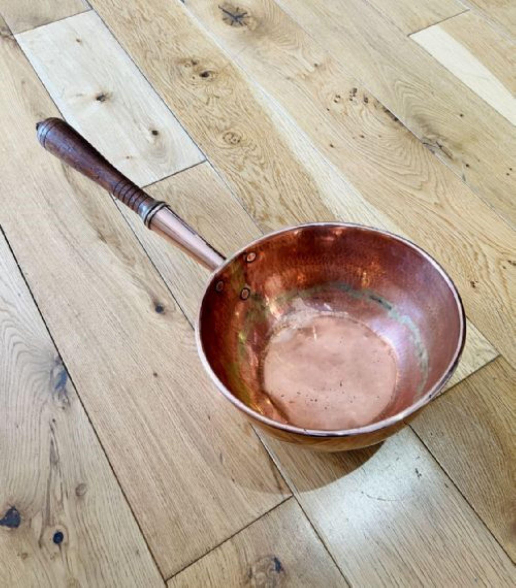 Large unusual antique quality George III quality copper pan having a quality antique George III copper pan with the original turned handle 