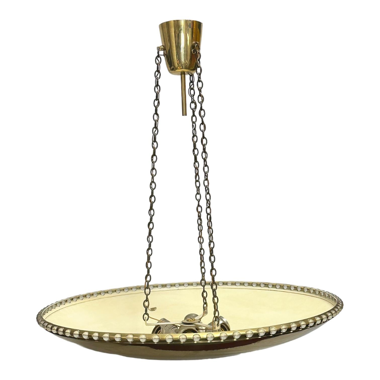 Beautiful and rare chandelier or pendant light by Kalmar Leuchten, Austria. An original mid-century vintage piece manufactured in the 1950s. It is made of a Brass bowl with cut glass beads and lacquered inside. The Fixture requires six European E27