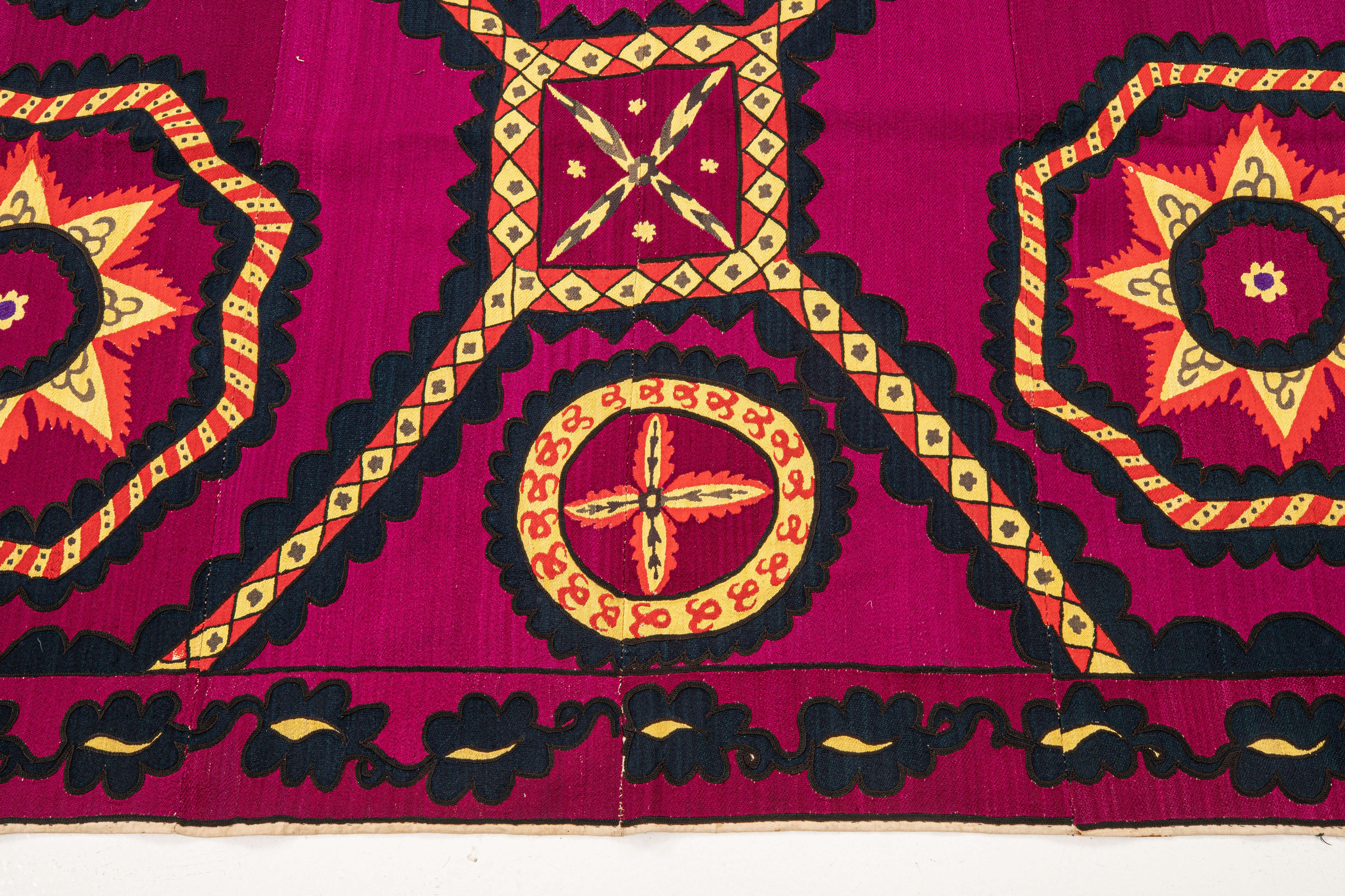 A lage finely embroidered, all over embroidered Suzani from the turn of the 20th century.