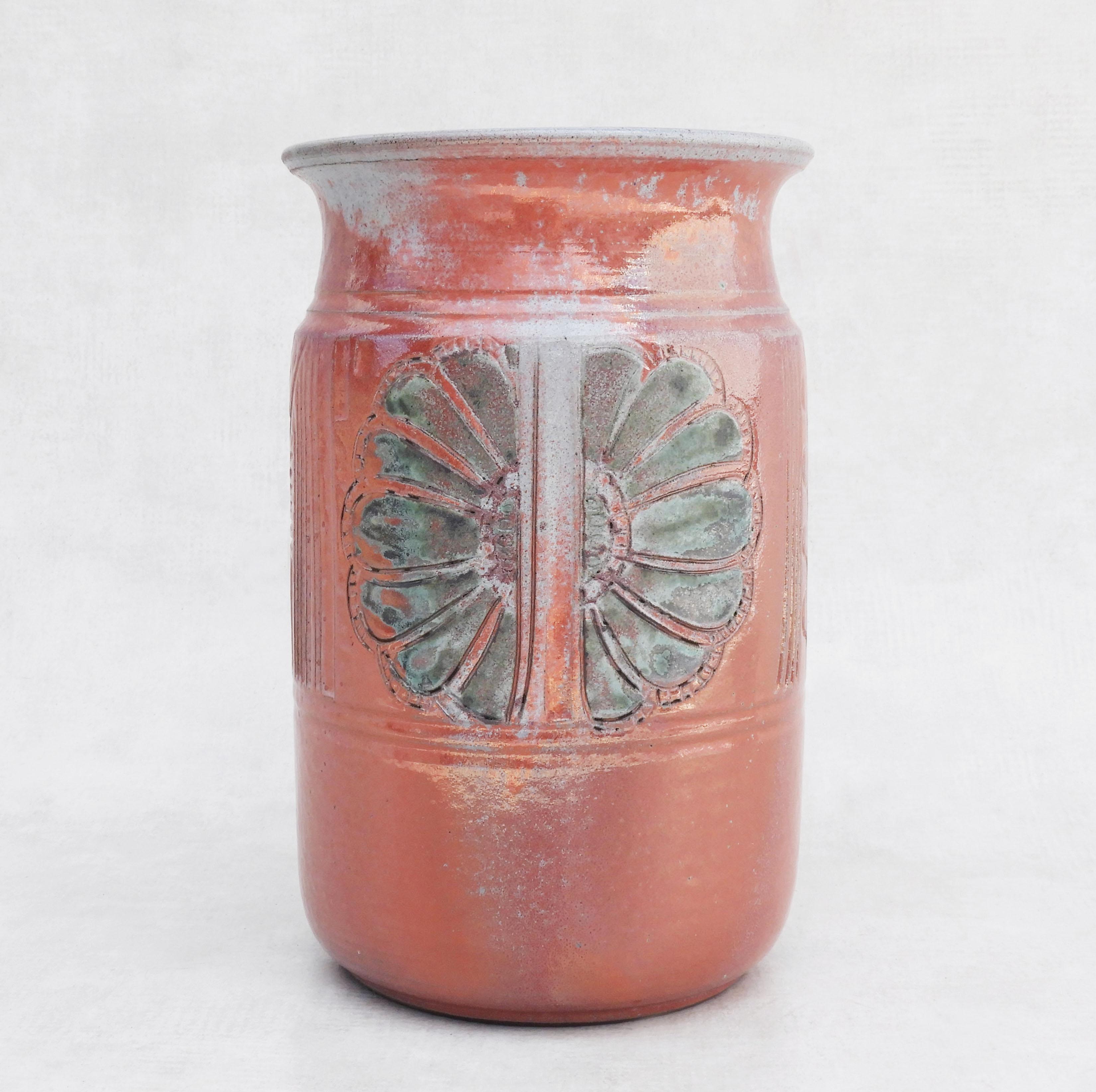Large Vallauris ceramic vase C1980s France
Stunning stoneware vase from French ceramic Artist Edmond Guizol.
Beautiful handcrafted oversize pot decorated with a floral motif in bas-relief and a subtle dusky pink and grey/green glaze.
A gorgeous