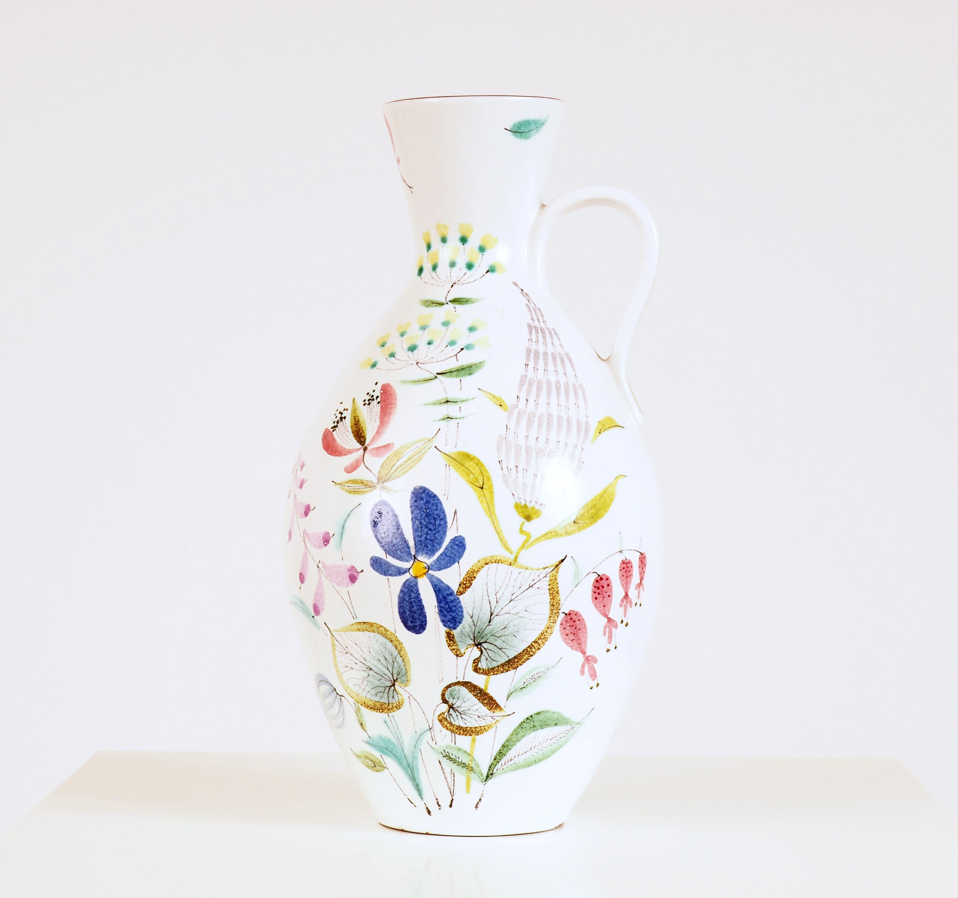 Large vase in hand painted faience by Stig Lindberg for Gustavsberg Studio. Lindbergs began painting faiences in the early 1940s together with Wilhelm Kåge.