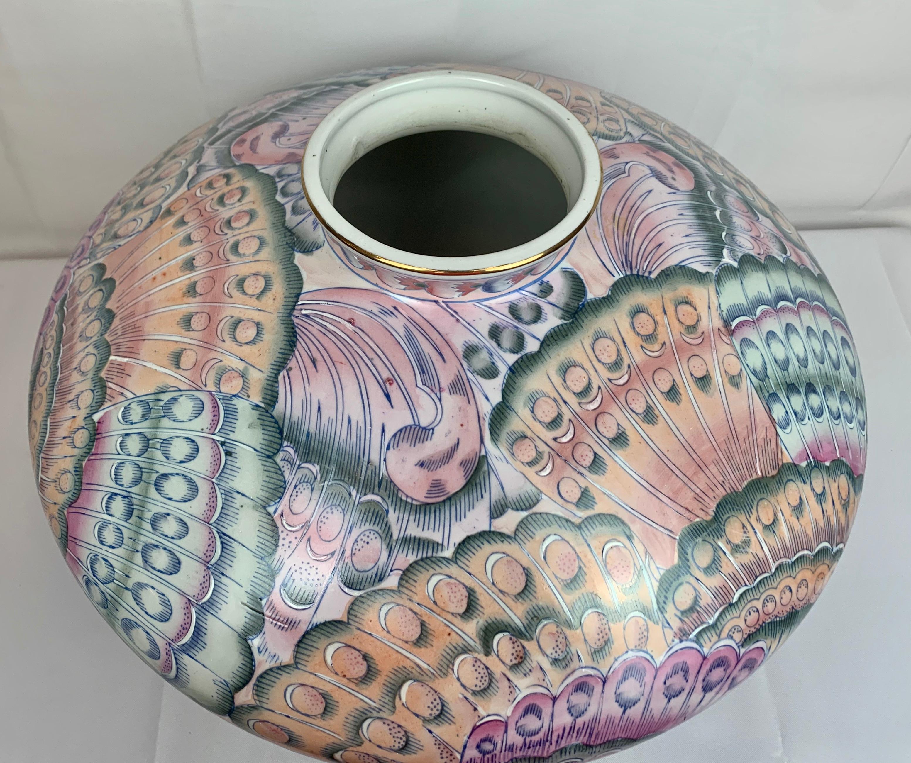 Large hand painted ceramic vase or jardiniere. The motif is of delicately painted pastel butterfly wings.  Designed as a vase, however, due to its size it could serve as a jardiniere.  The hand decoration is interesting enough for this piece to