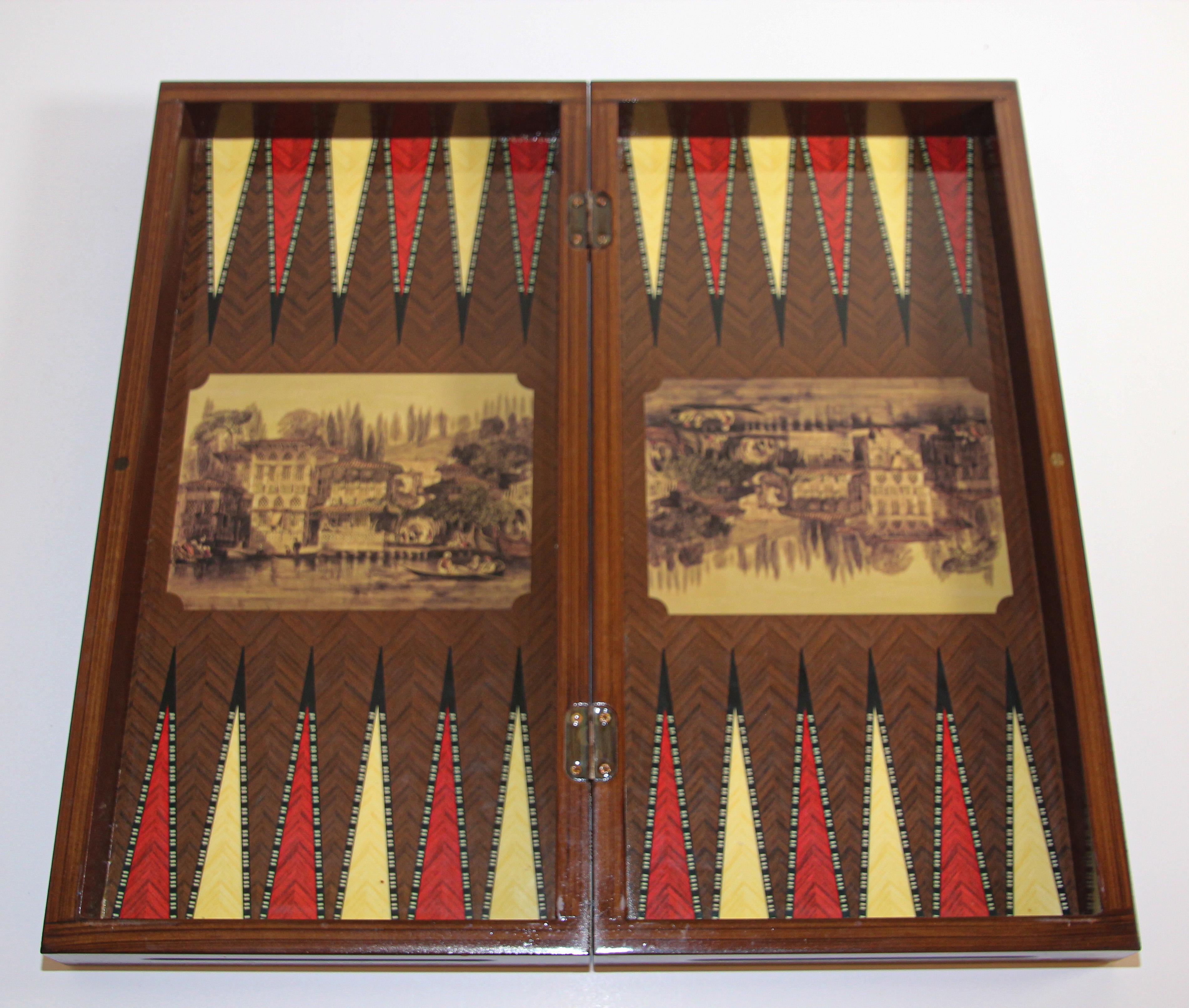 Large Venetian Backgammon board box with game pieces, Italy
Great game box features Paintings of Medieval Moorish scenes of Venice on the exterior and backgammon board on the interior with smaller paintings.
After oil paintings of the Entrance to