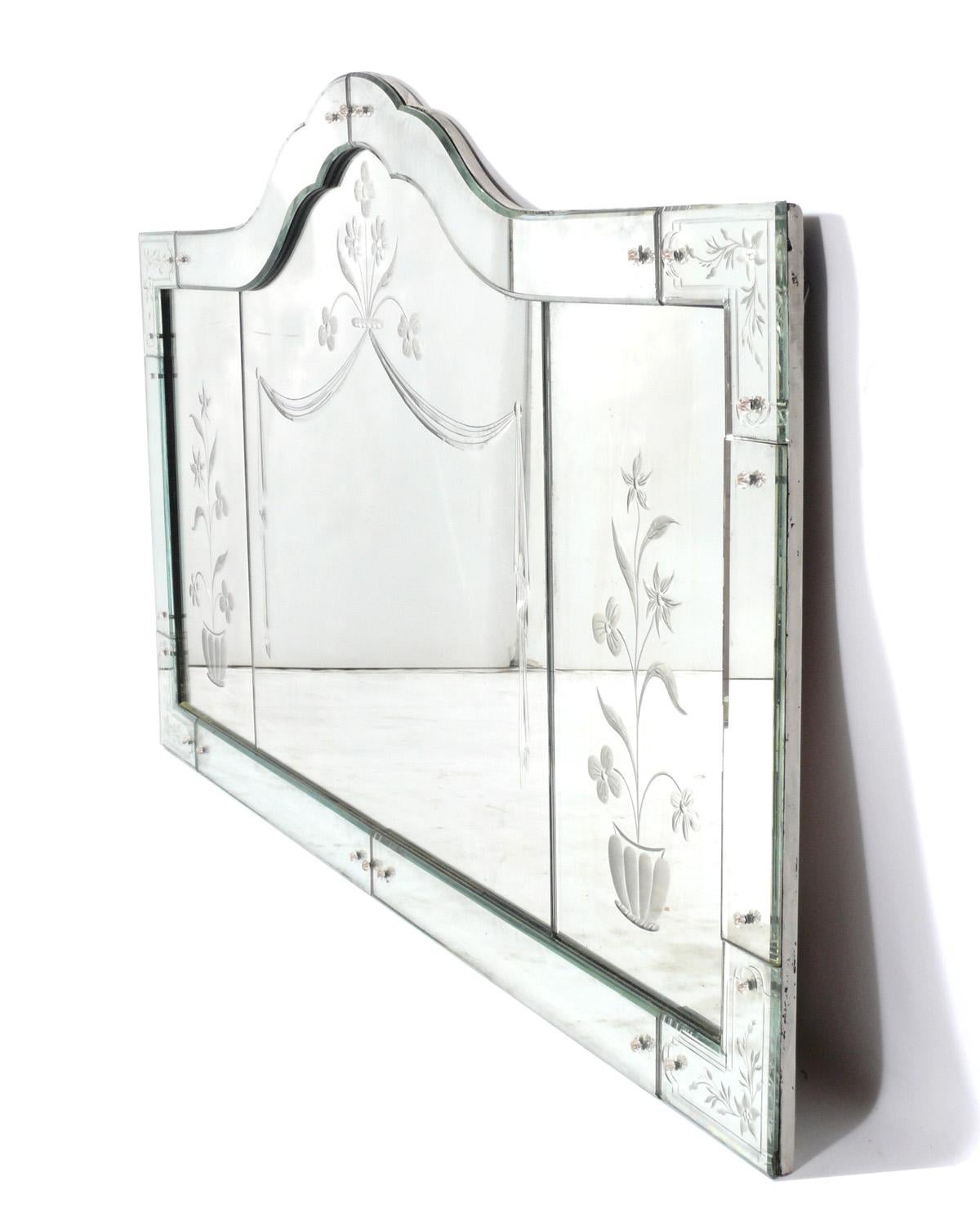 Large Venetian mirror with etched floral decoration, Italy, circa 1940s. Retains warm original patina.