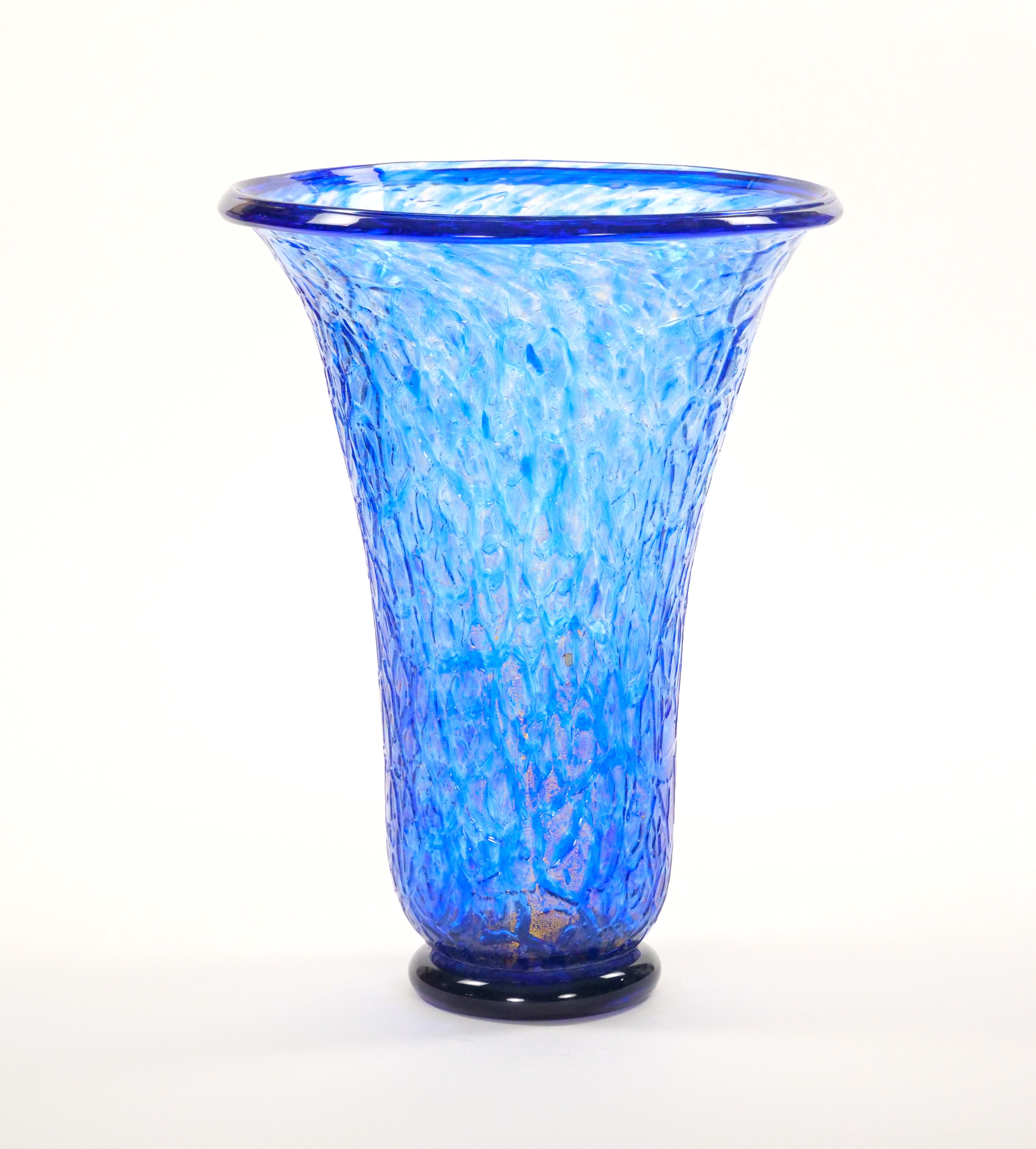 Introducing an exquisite 20th century Venetian Italian mouth-blown and hand-crafted decorative vase. This stunning piece features a captivating geometric shape, showcasing the remarkable craftsmanship of Venetian glassmakers. The vase boasts a