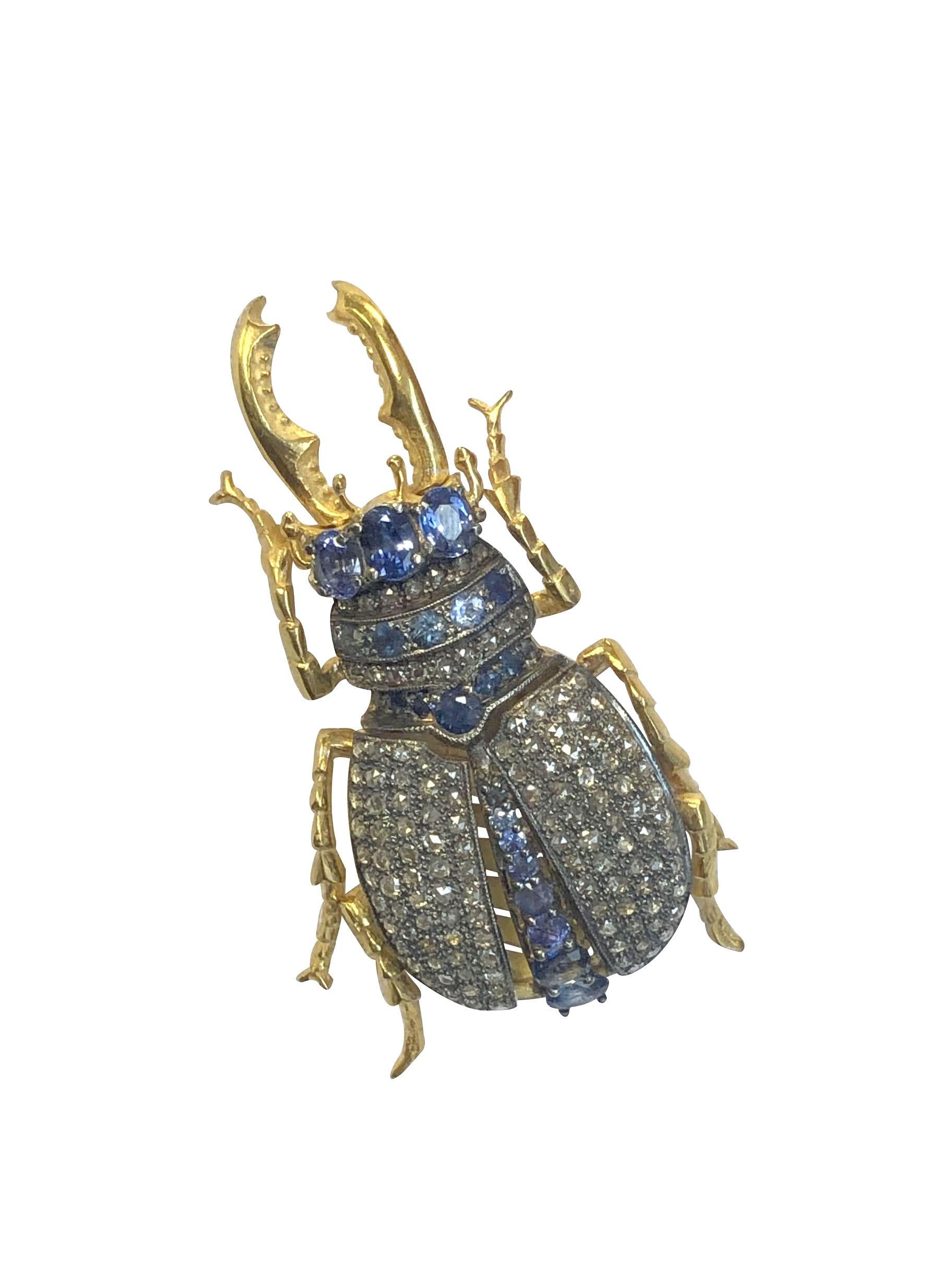 Large and impressive Beetle Form Brooch Pendant, measuring 2 1/4 inches in length X 1 1/4 inches wide, set with Rose cut Diamonds totaling approximately 2 Carats and further set with round and Oval Sapphires. This piece is masterfully Articulated,