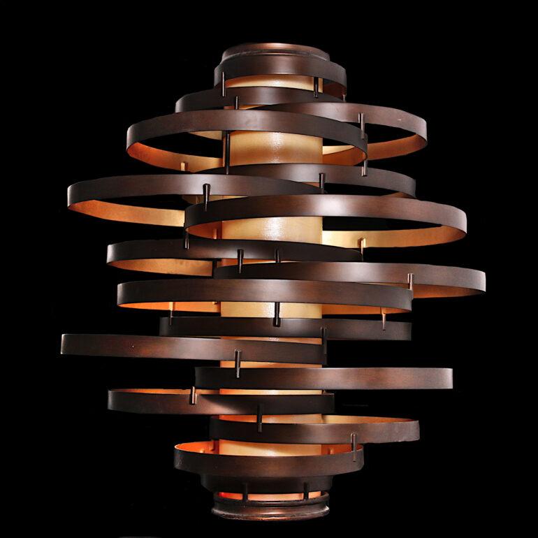 Very Large Vertigo chandelier. This work of art is an intertwining collage of circular handcrafted rings fused together to create a contemporary collection with a truly inspired concept. Included is 40 inches of thick chain and the original mounting