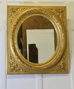 Large Very Decorative Gilt Oval Panel Mirror This is an outstanding piece
