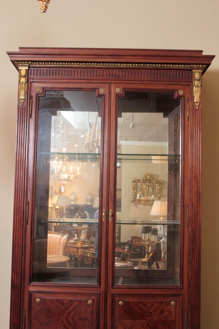 Very fine French cabinet by Paul Sormani. Louis XVI design with very fine gilt bronze mounts. Signed P Sormani. Illuminated.