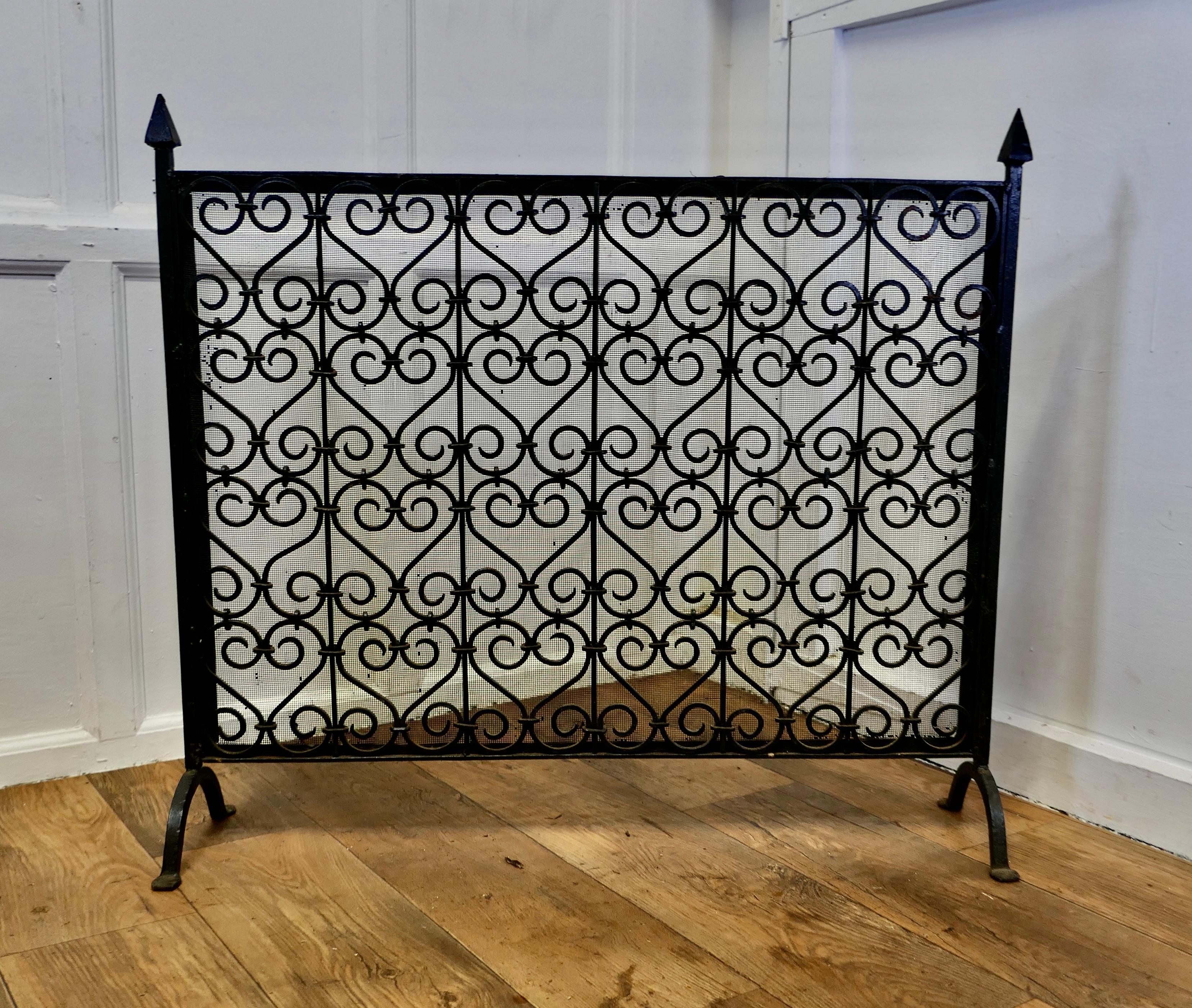 Large Very Heavy Old Gothic Wrought Iron Fire Screen

This is a very attractive piece, the wrought iron work is superbly executed with a fine mesh infill, a rare find
In good sound condition and a very attractive addition to any Fire Place
The