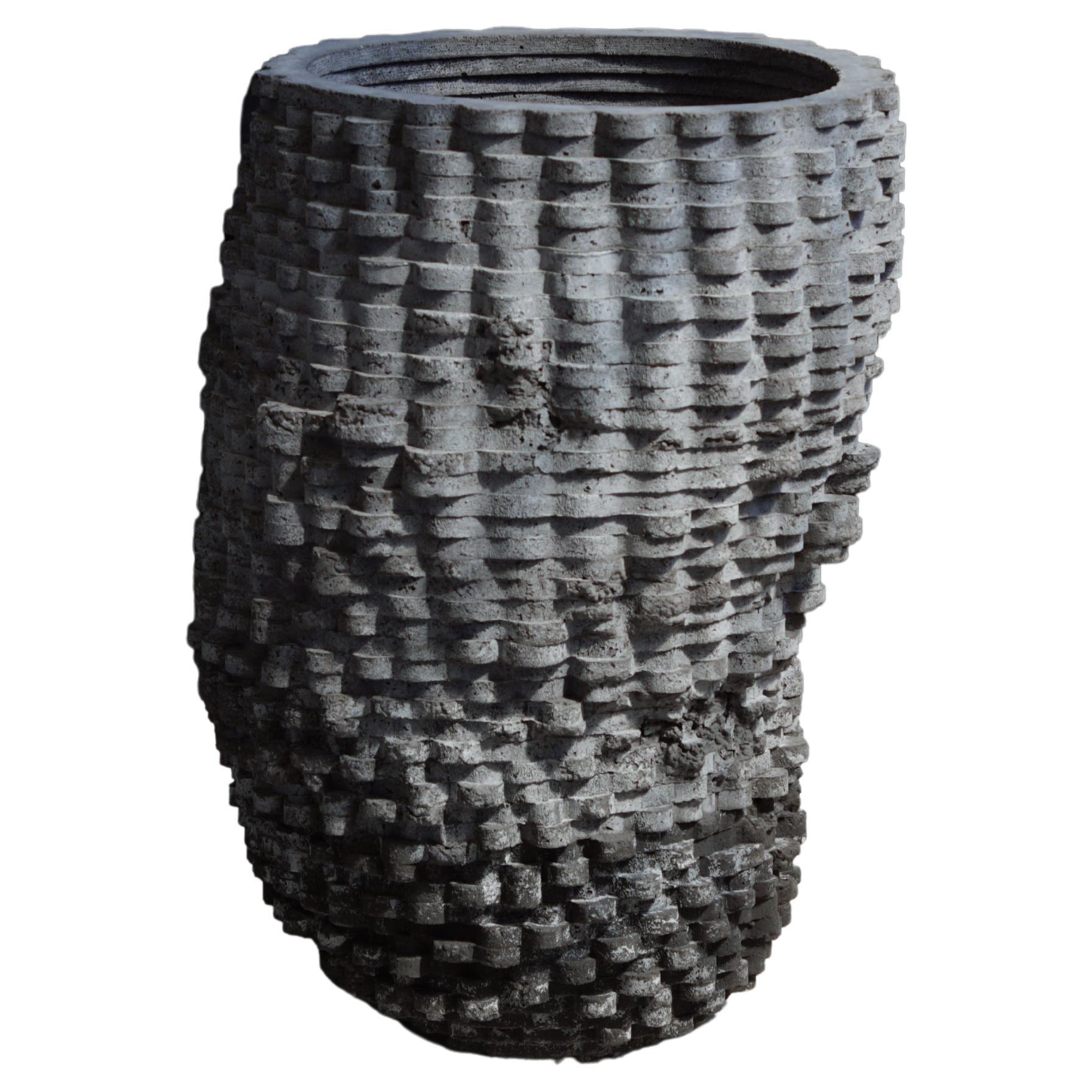 Large vessel for indoor and outdoor use. Can be made with drainage holes.

At the intersection of art, craft, and design, Concrete Poetics' debut collection of hand-cast cement sculptural furniture and accessories streamlines visually intriguing and