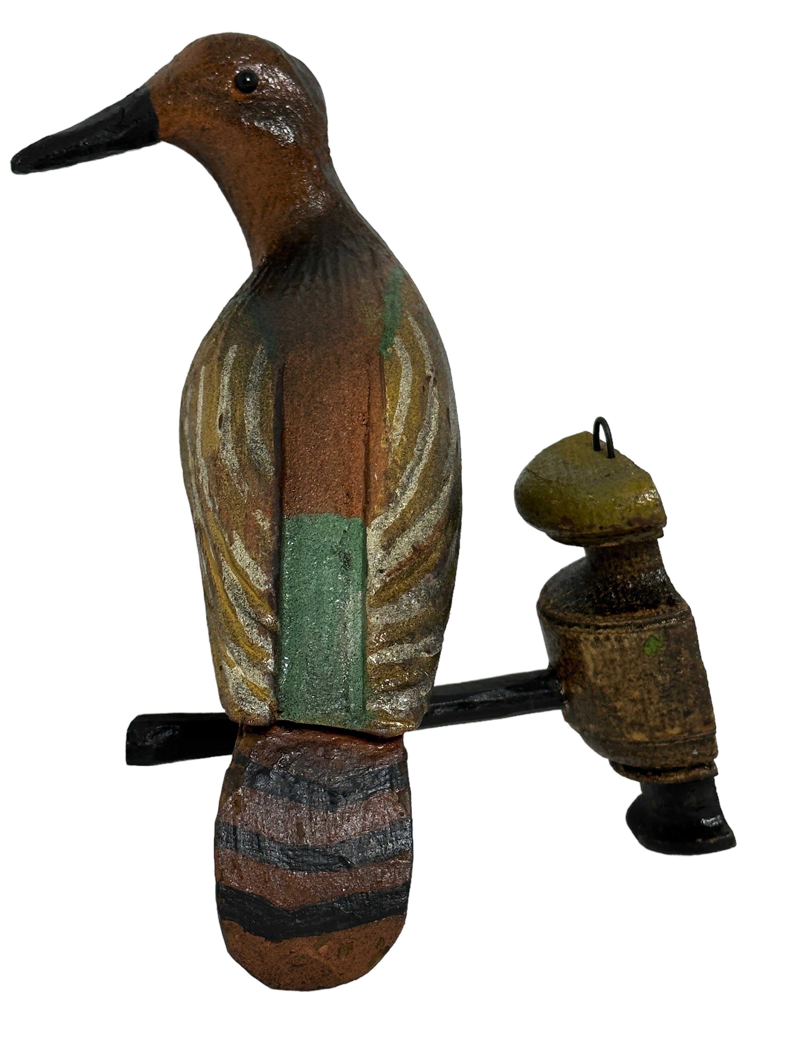 A beautiful large Austrian early 20th century, carved wood bird, mounted on a wooden stand for hanging. The tradition of these in Austria called 