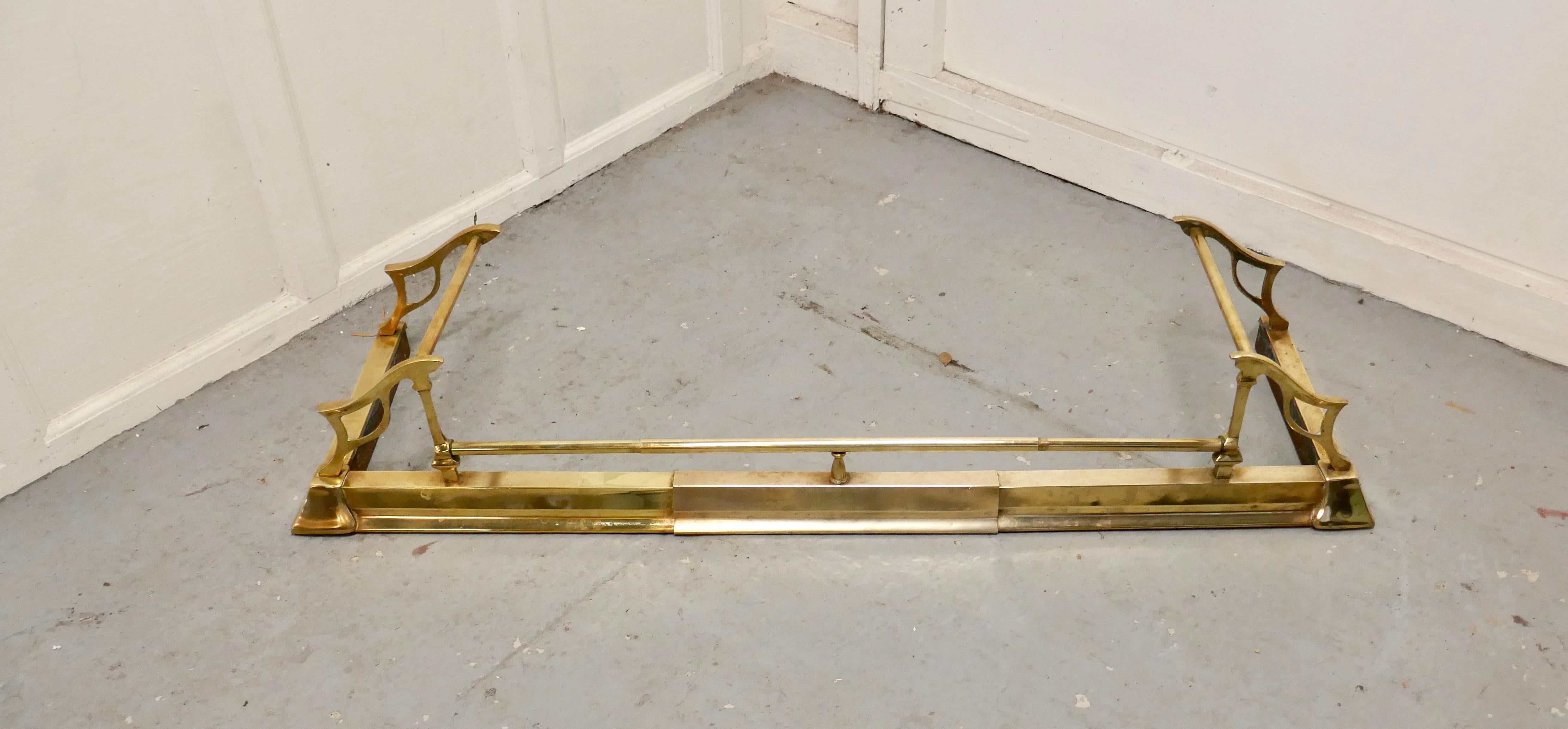 Large Victorian Art Nouveau brass fender


 This is a beautifully designed Victorian brass fender it has superb Art Nouveau Style worked in brass and can be altered in length by simply pulling it out from the sides
The fender is in good