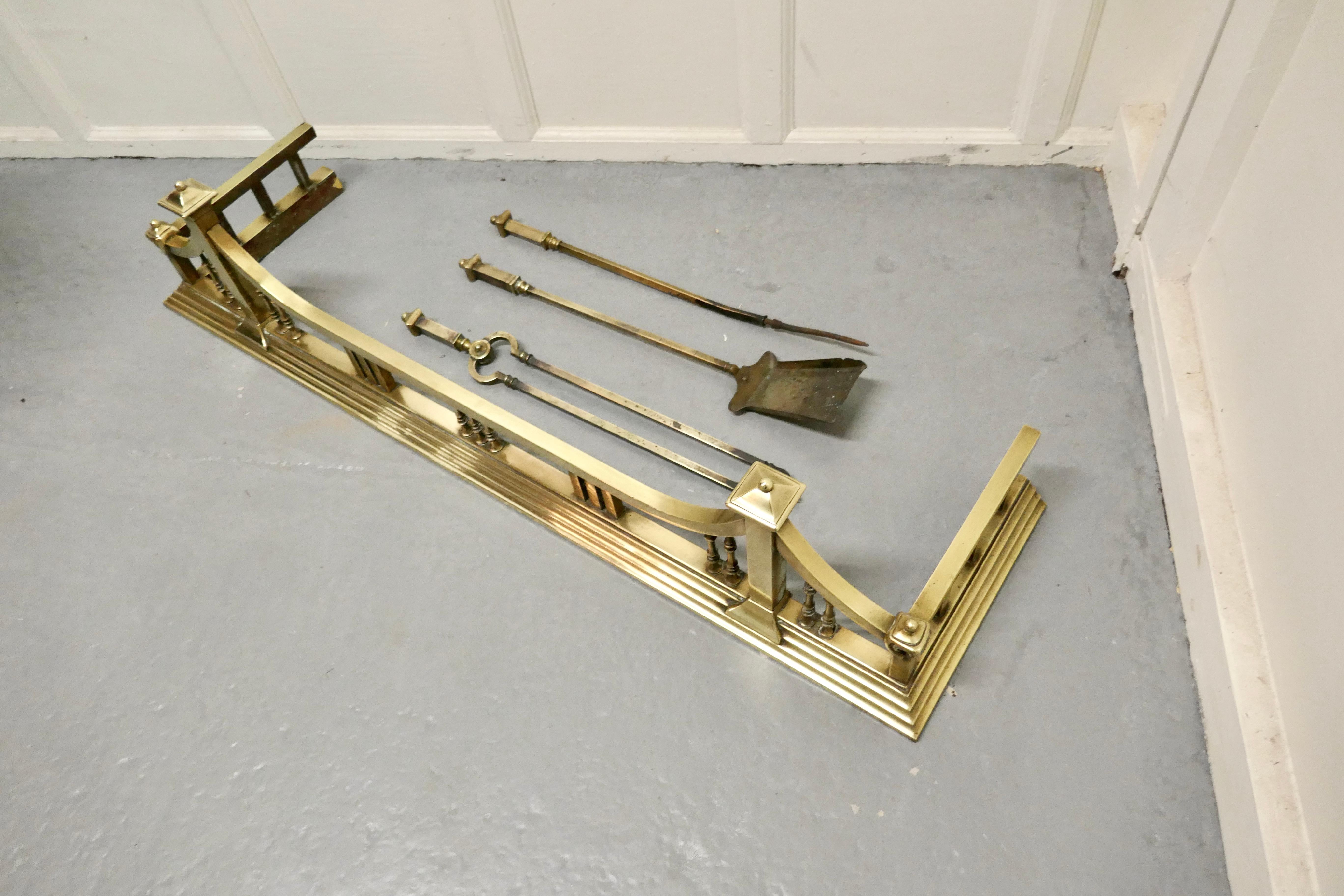 Large Victorian Arts & Crafts brass fender and tools

This is a beautifully designed heavy brass fender it has a superb brass surround the fender comes with it own set of long fireside tools, poker, shovel and tongs
The fender is in very good