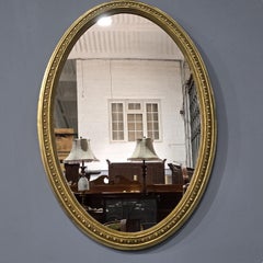 Gran espejo oval victoriano dorado