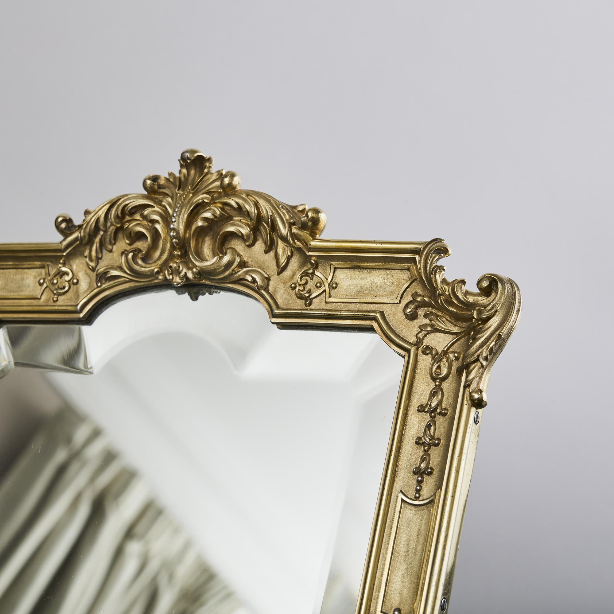 Cast, gilded and solid first standard French silver mirror frame of superb quality, beautifully made and of substantial weight. It was made at the end of the 19th century by Gustave Keller Frères, a high-end jeweller founded in Paris in 1856. The